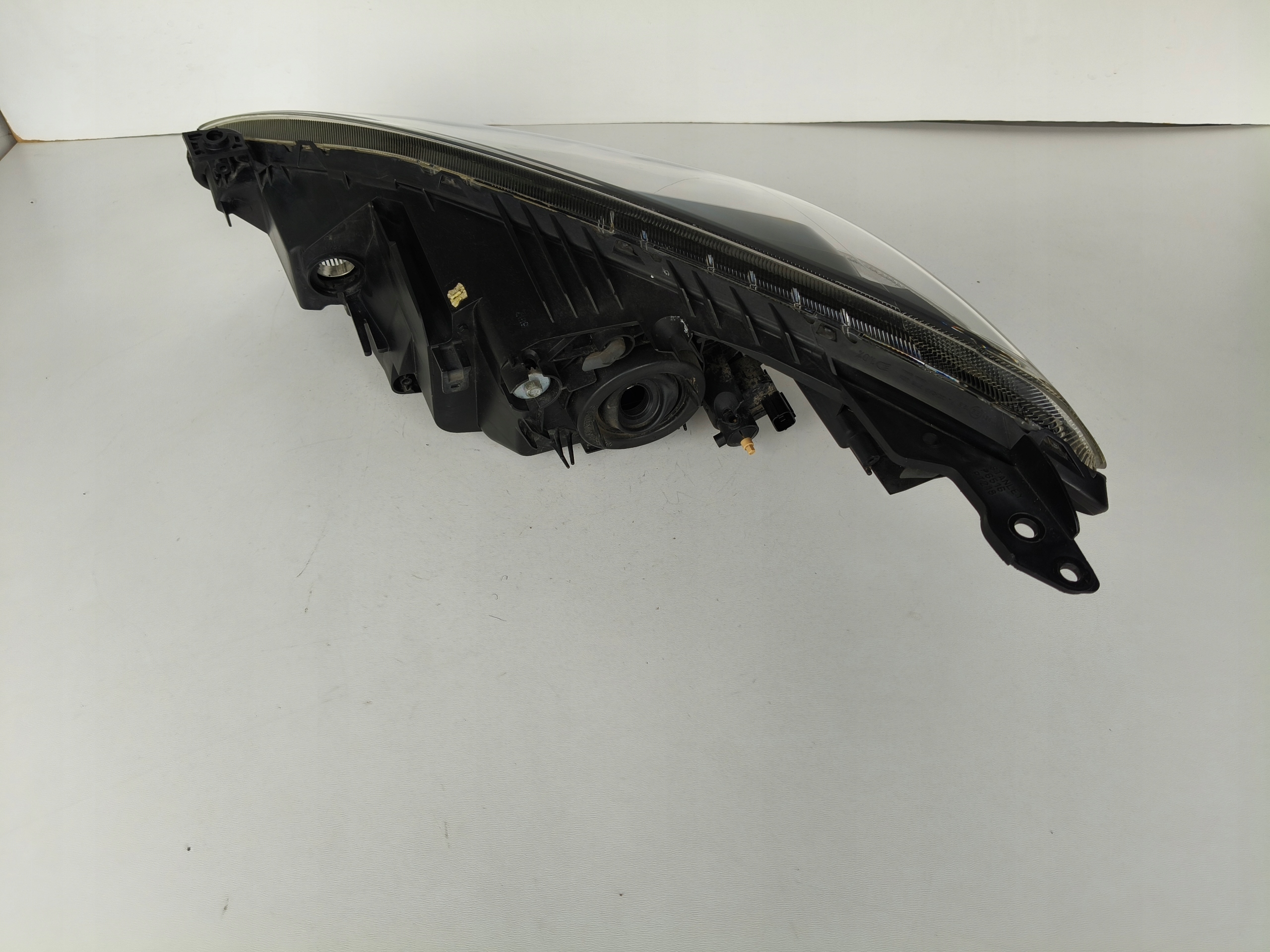 light right REFLEKTOR MAZDA 2 07