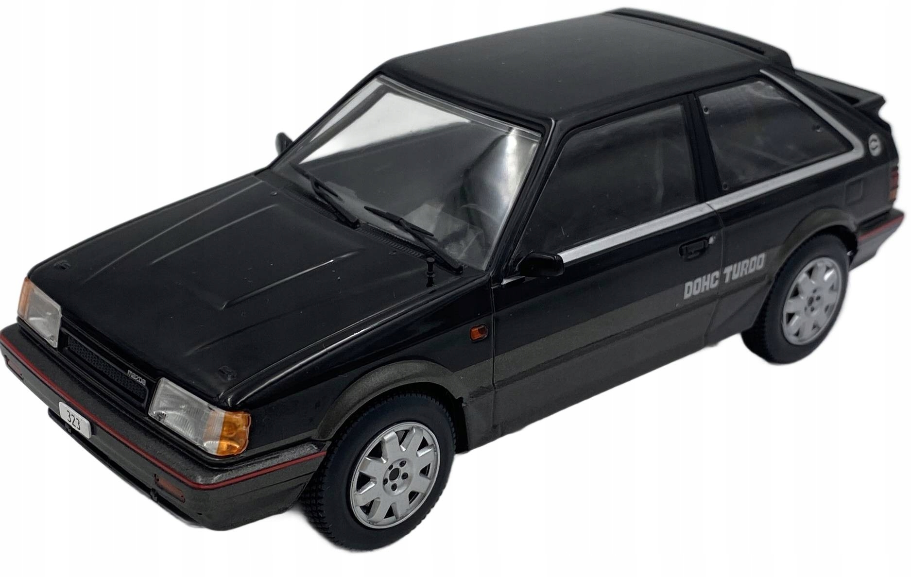 Mazda 323 4WD Turbo 1989 model 124222 WhiteBox 1:24 černá