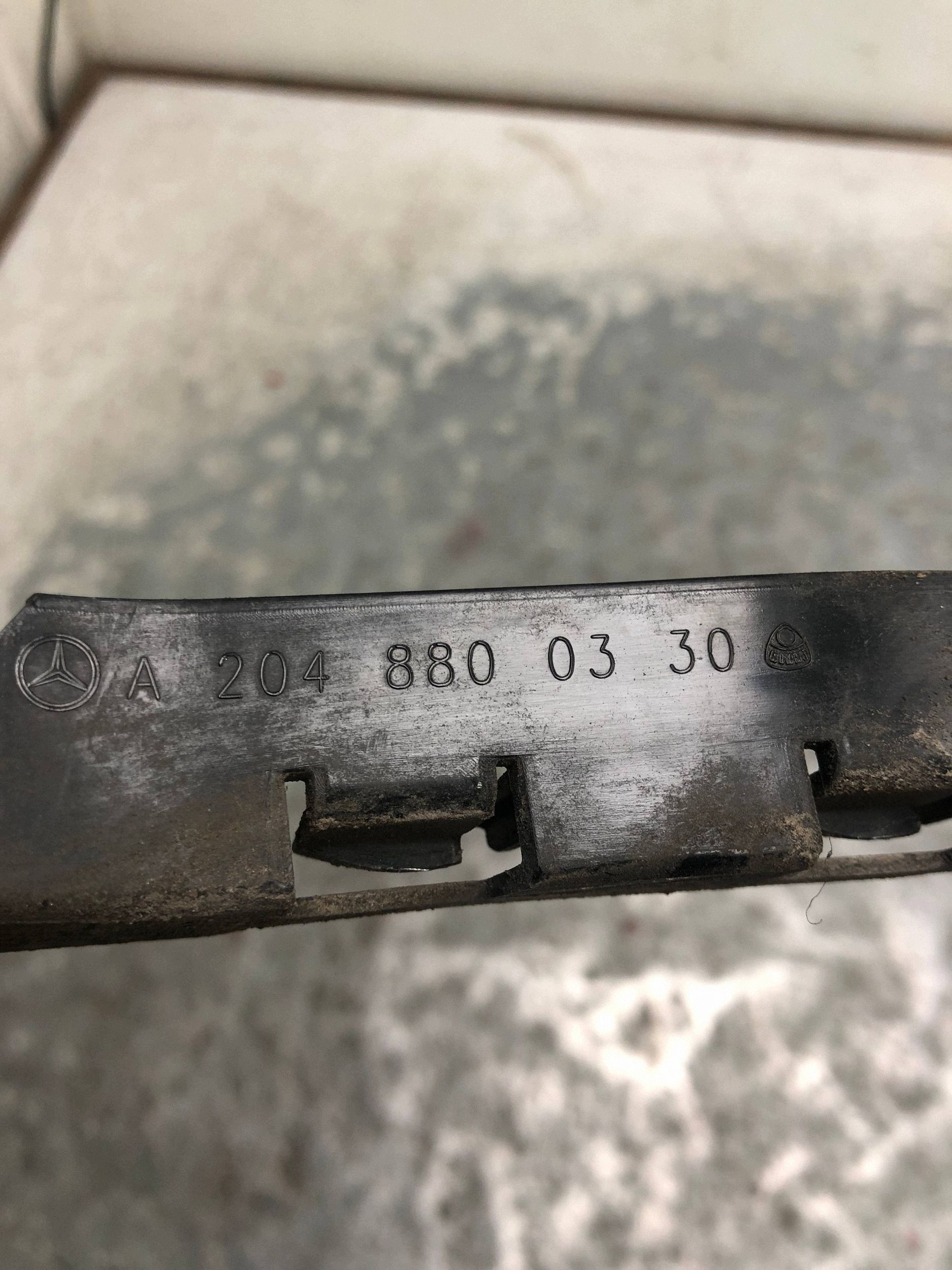 bumper bracket left rear part MERCEDES W204 sedan A2048800330