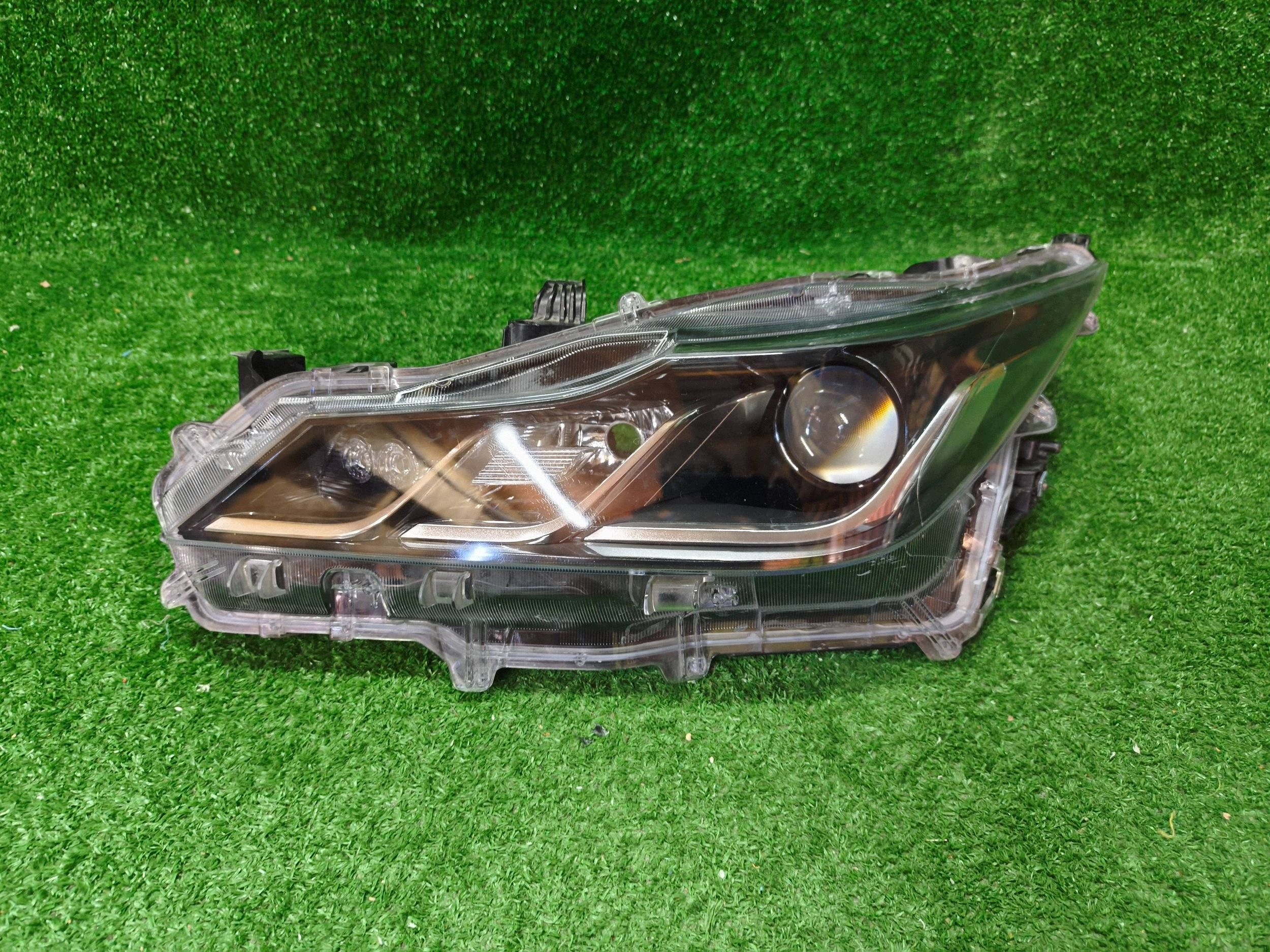 REFLEKTOR left front TOYOTA COROLLA E21 sedan LED NR.1557