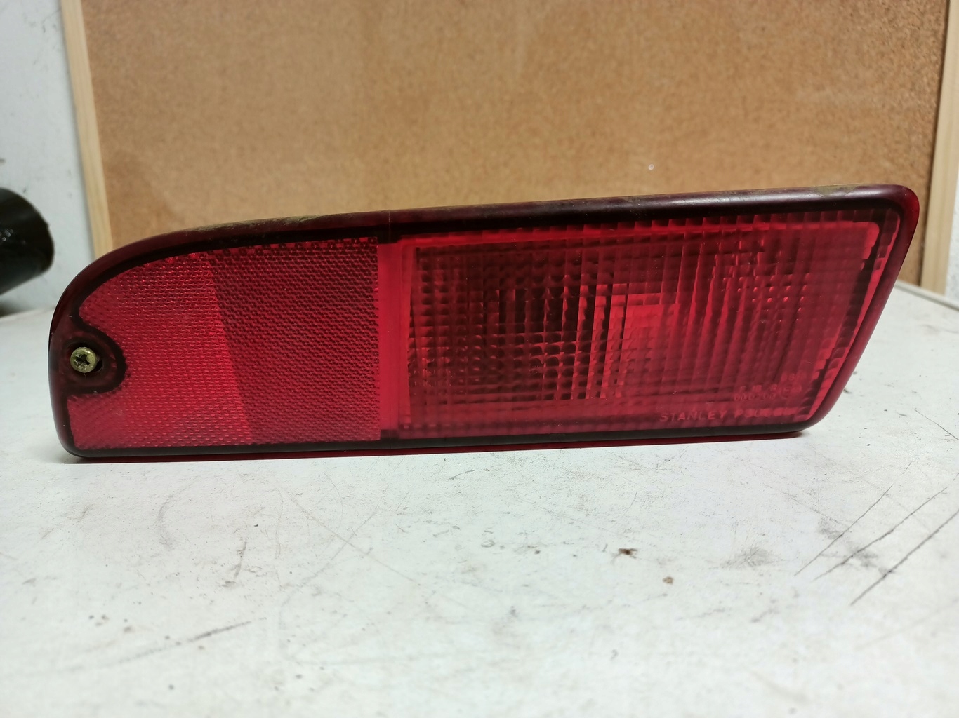 фонарь левый бампера subaru JUSTY IGNIS 03-08