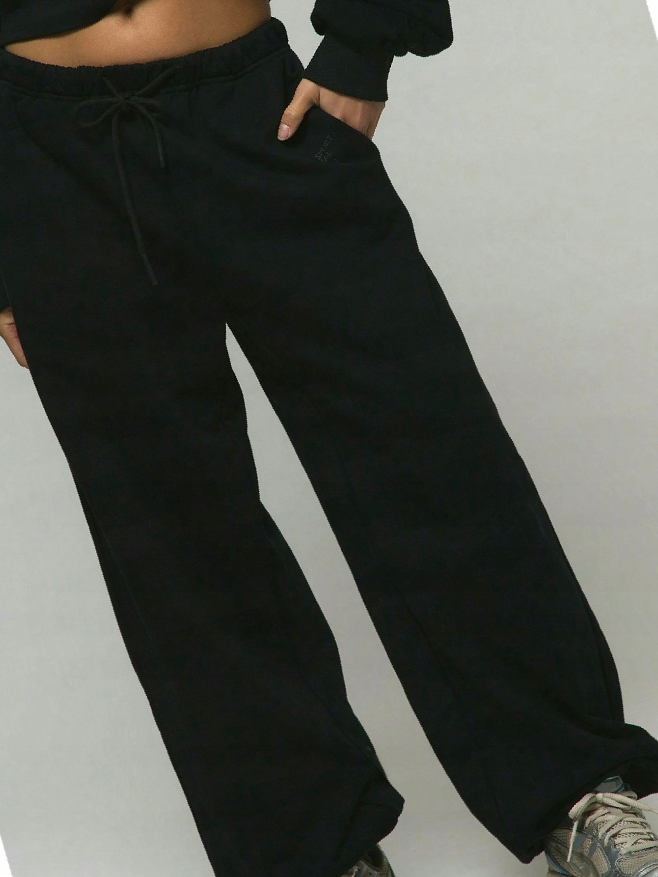 Dámské teplákové kalhoty Musera s nízkým pasem černé Casual L 40