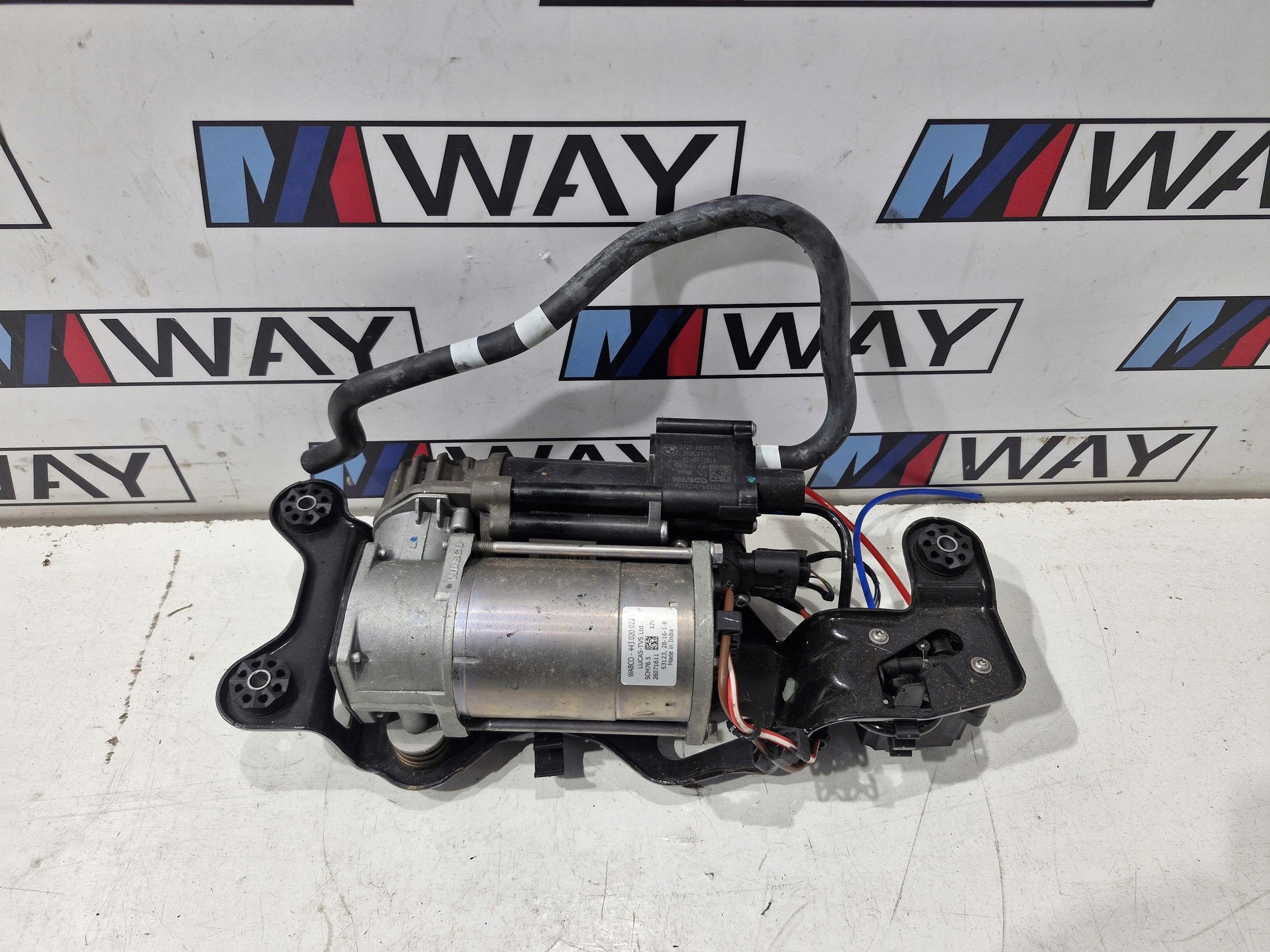 6875177 BMW F15 F16 compressor; springing original