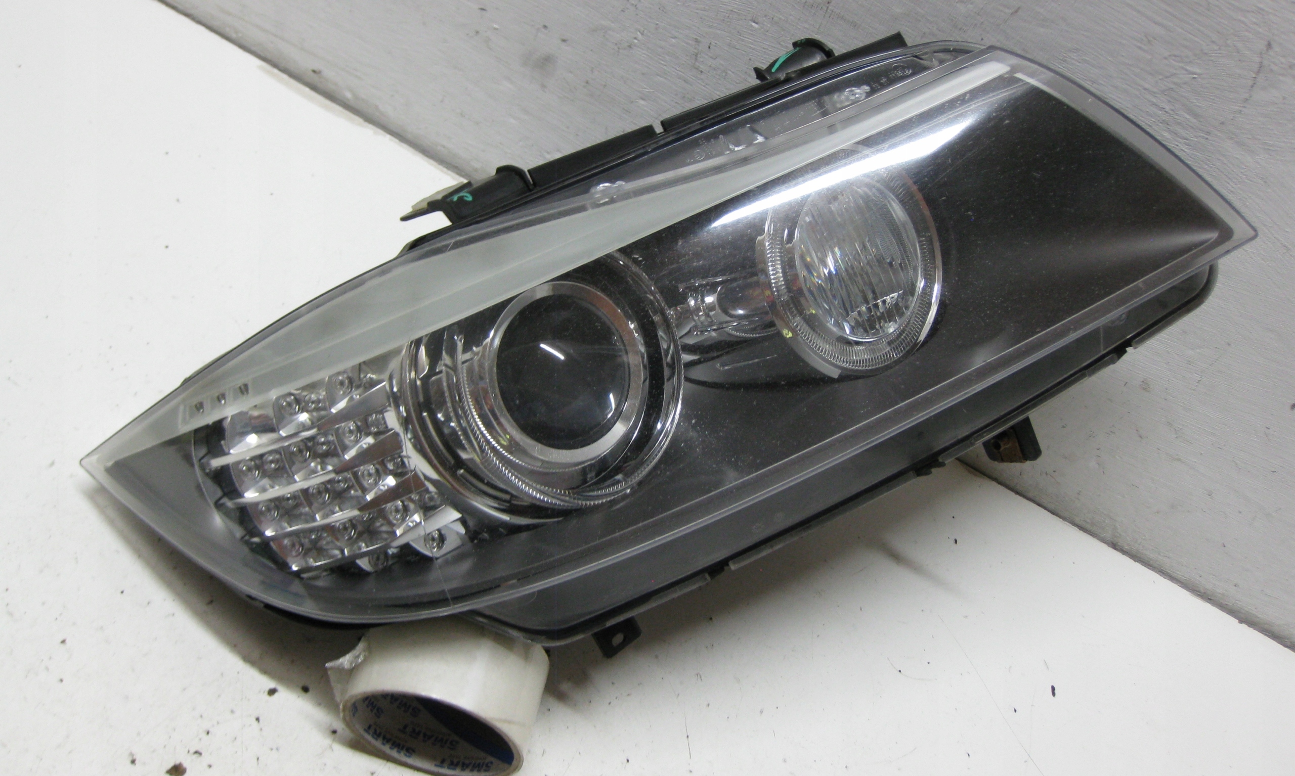 BMW E91 2.0 D 09R light right front XENON 7202590