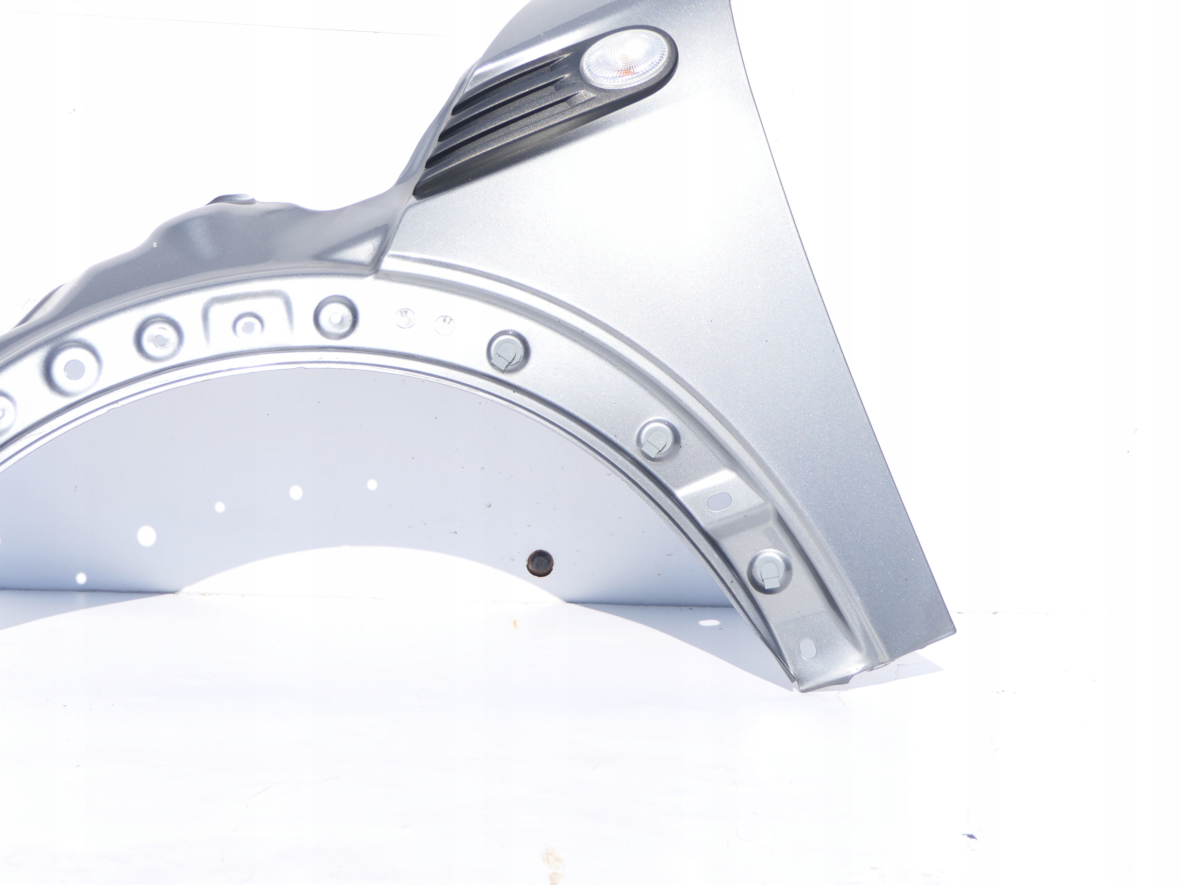 Błotnik przód przedni lewy Mini Cooper II 06-10r. DARK SILVER 871/7 Producent części Renault OE