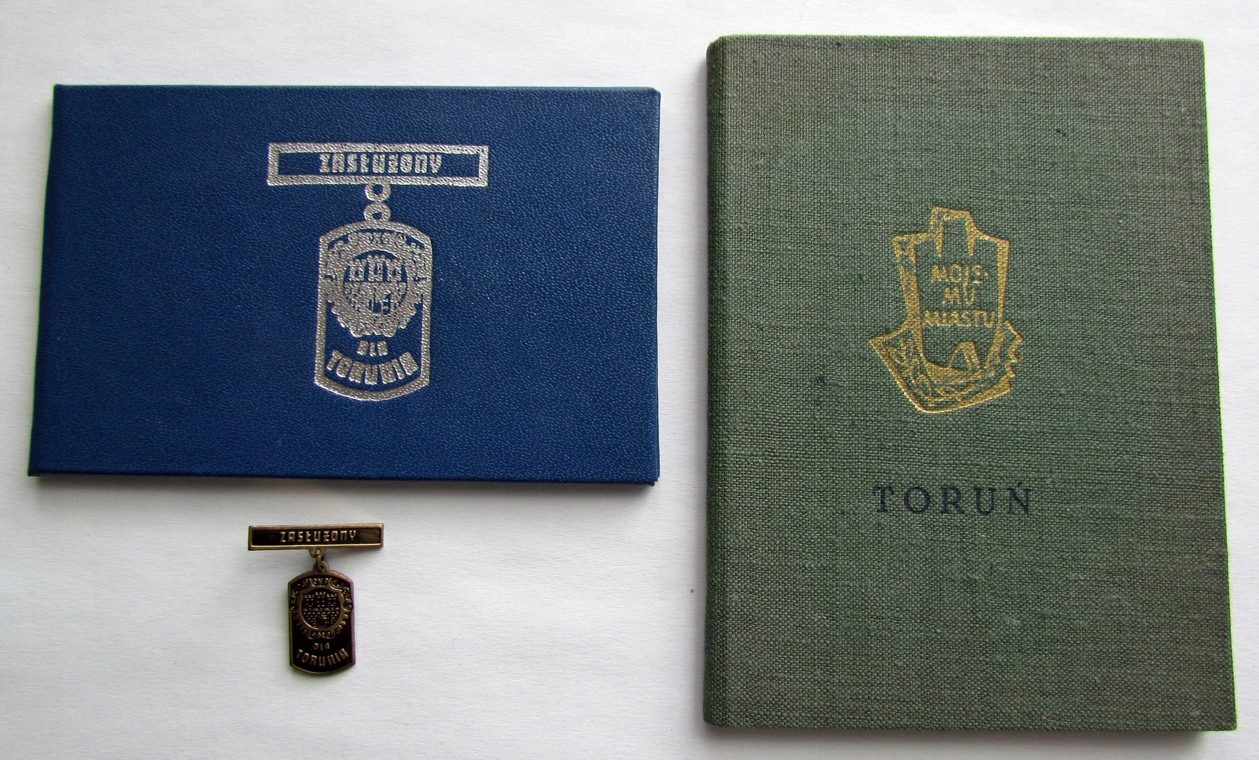 ТОРУНЬ ЗНАЧОК ЗАСЛУЖЕННЫЙ ТОРУНЬ ЗАКОННО. И БУКЛЕТ