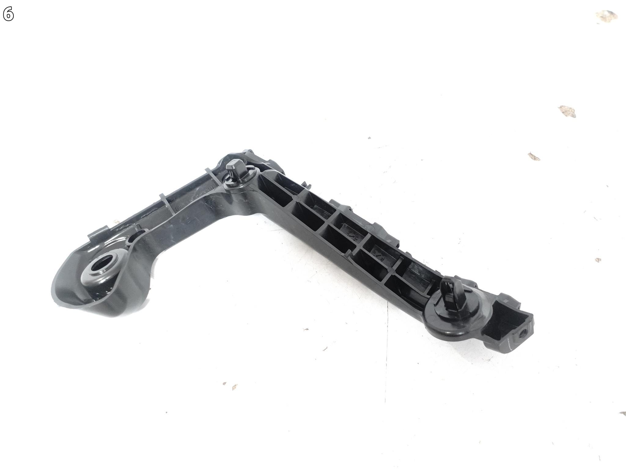TOYOTA COROLLA E21 XII 18- support holder W bumper front right ORG