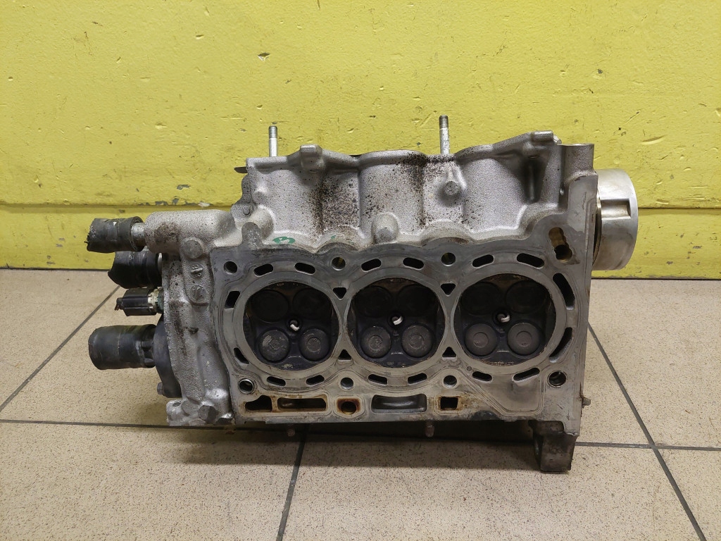 DAIHATSU CUORE 1.0 head. of the engine
