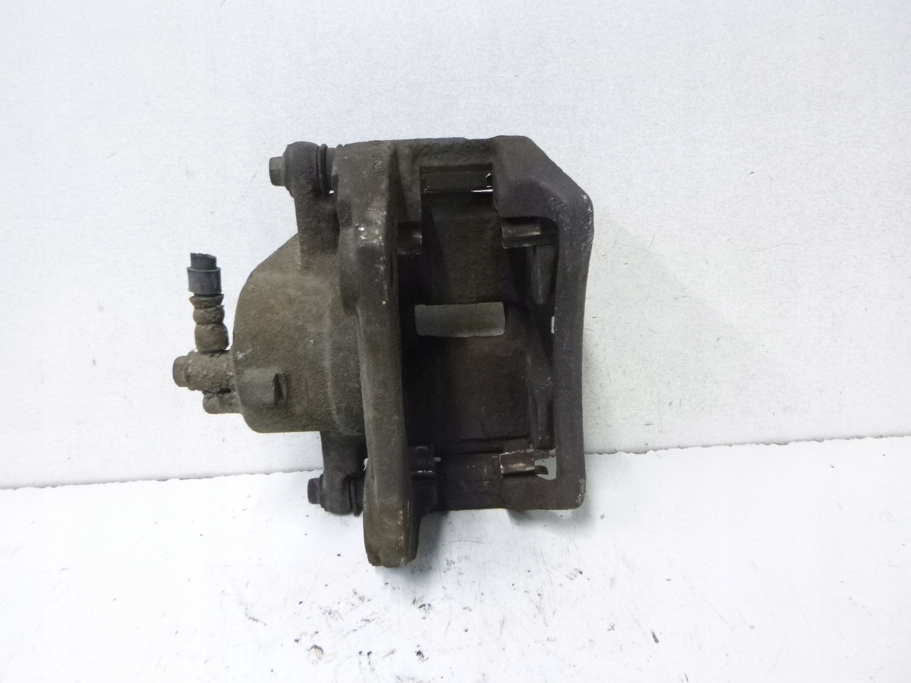 caliper brake front right Nissan Primera P12 1.8 02-07r.