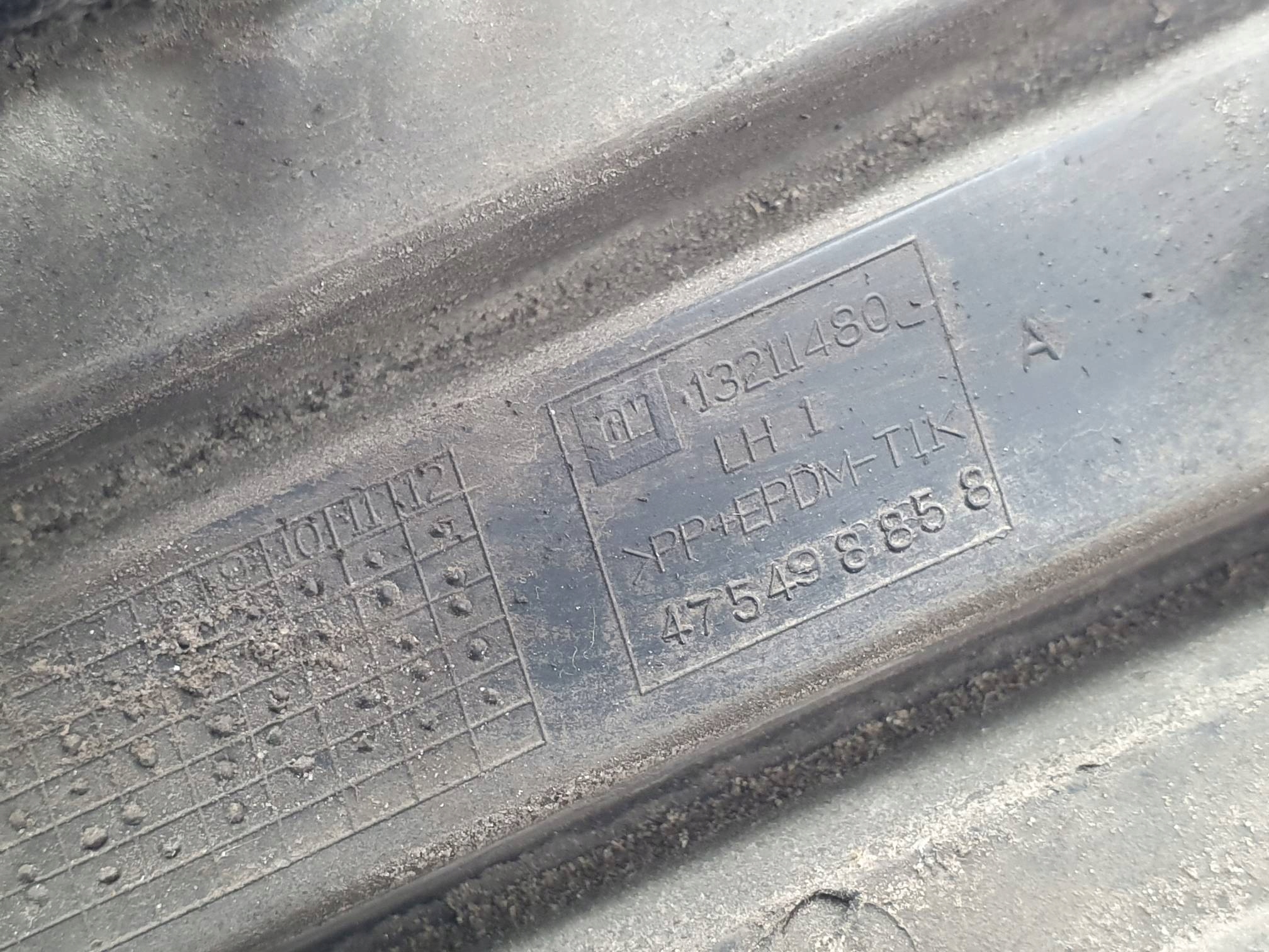 grid of a bumper front 13211480 OPEL CORSA D