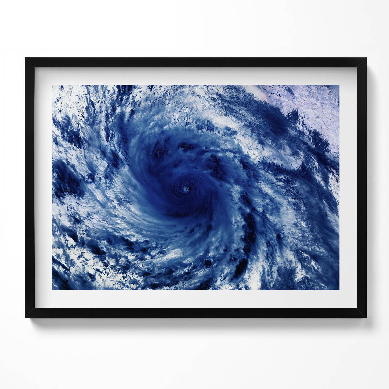Obraz na zeď v černém rámu Foto Nasa Vír mraků z vesmíru 80x60 cm