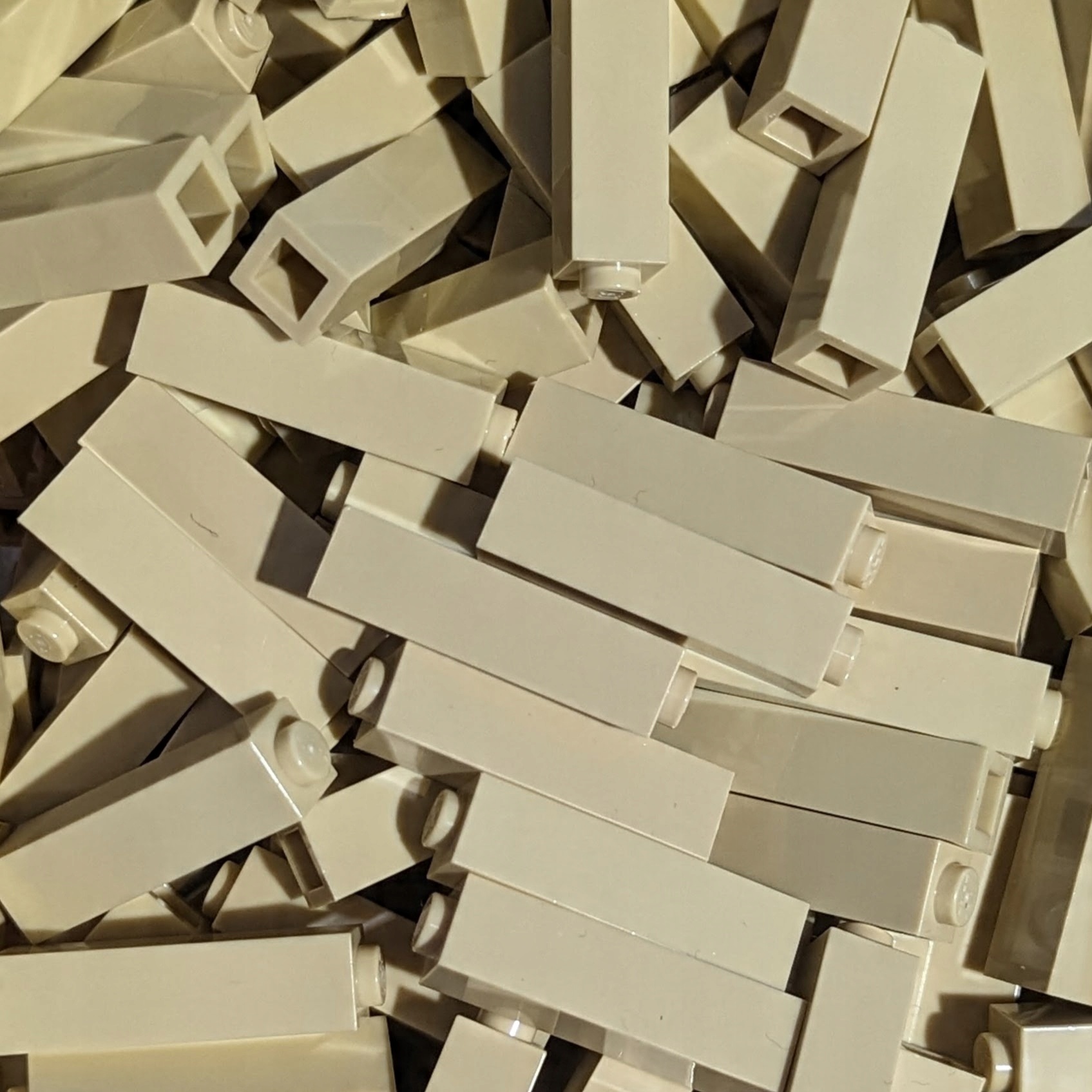 

Pakiet Lego 14716 Klocek 1x1x3 piaskowy tan 10sztN