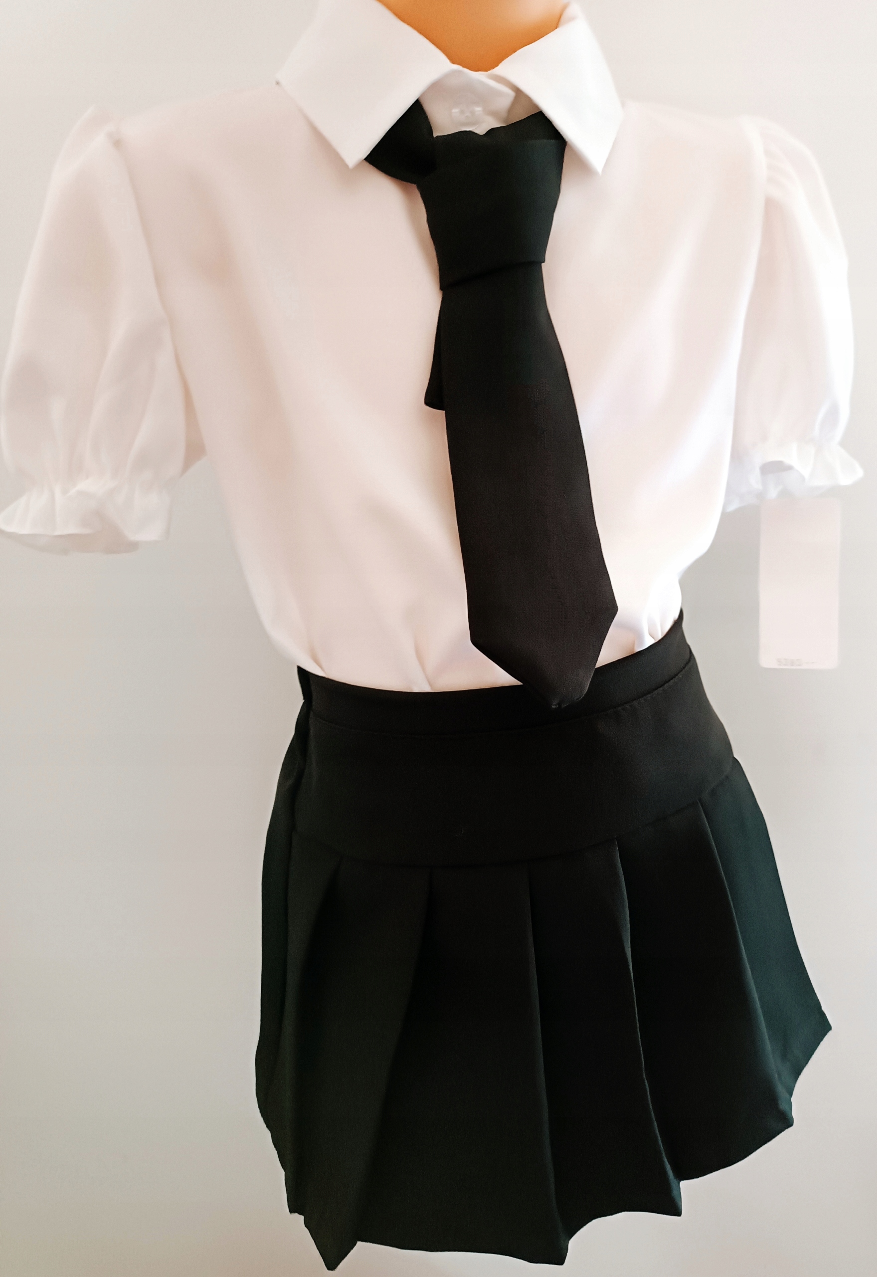 Komplet dziewczynki biała bluzka czarna spódniczka spodenki 116 - 122 Marka Inna marka