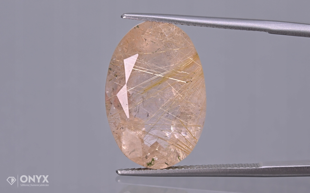 Křemen s rutilem fazetovaný ovál 21x14 mm