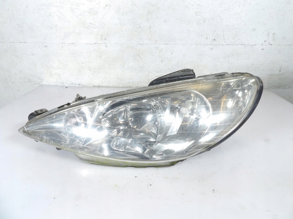 PEUGEOT 206 SW REFLEKTOR left TYC 20-6156