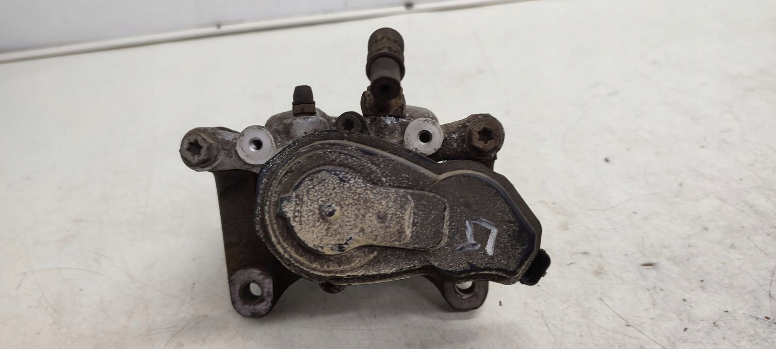 caliper rear part rear left Opel Astra K LIFT 1,5 CDTI