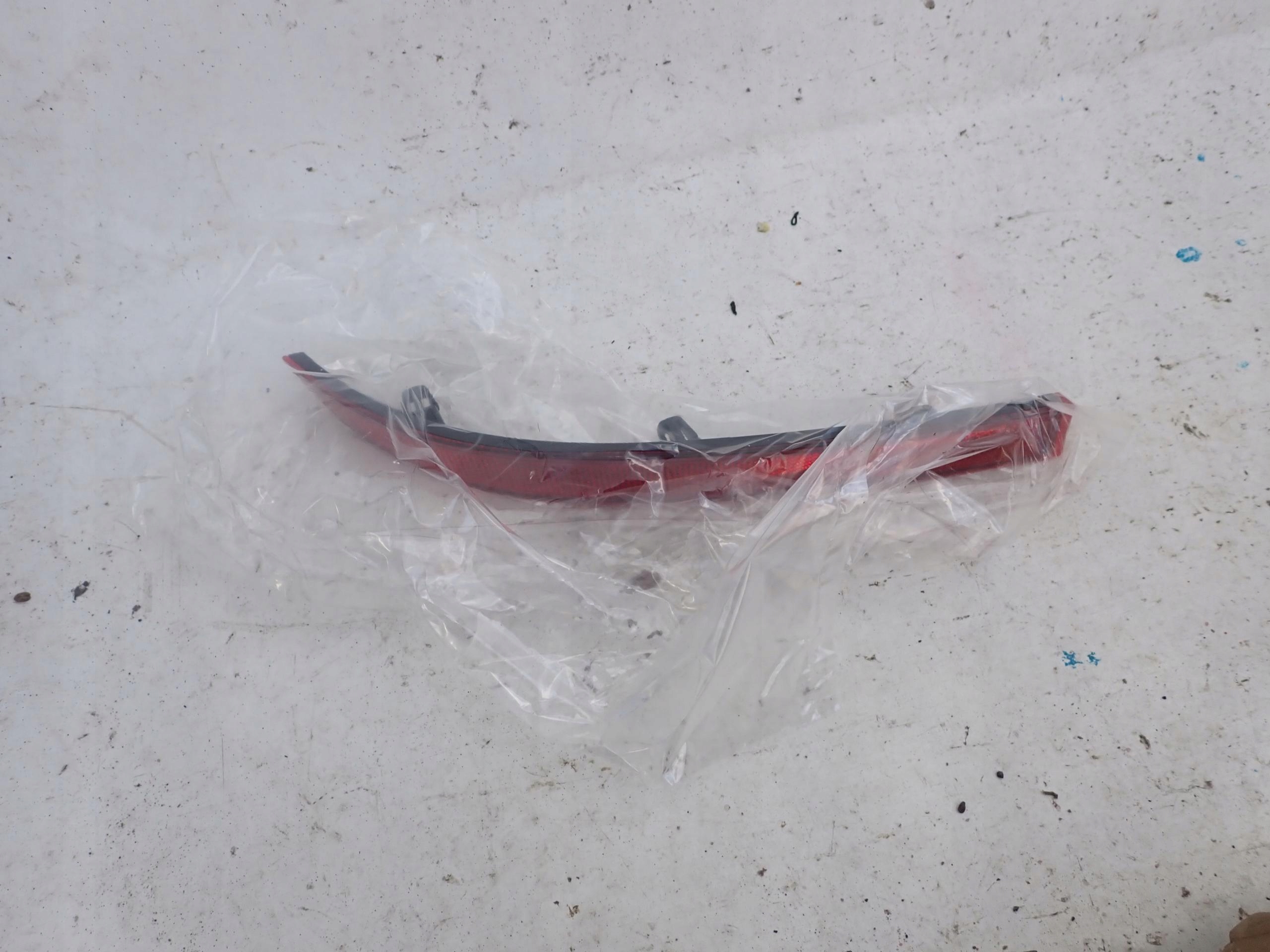 VW TOURAN 6-10 ODBLASK left rear part