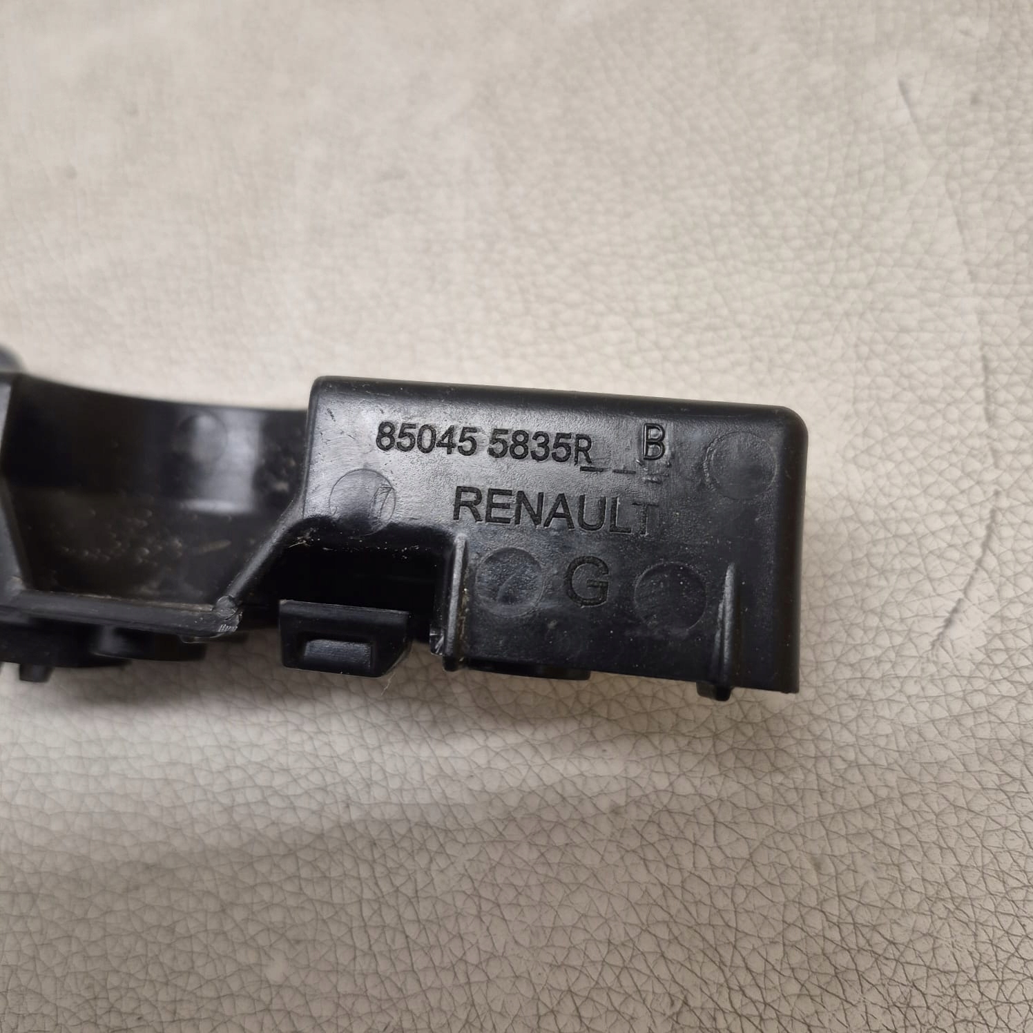 DACIA SANDERO III 3 20-> bracket holder support left rear part