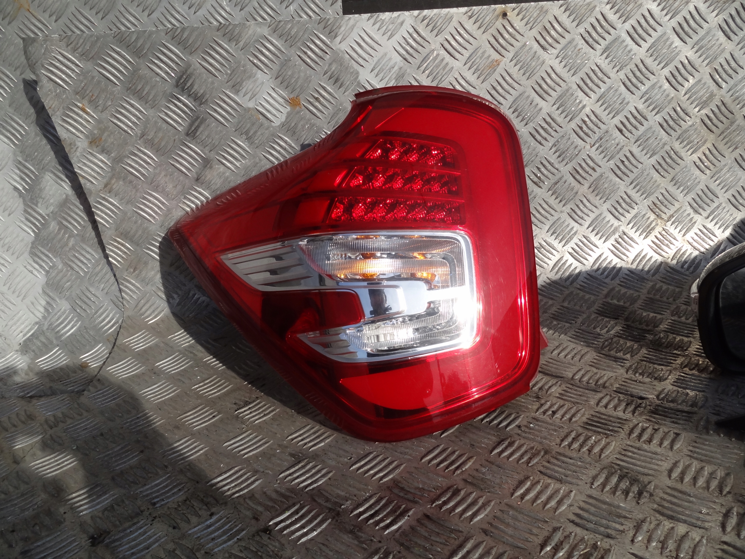 фонарь левый задний TIVOLI европа oe