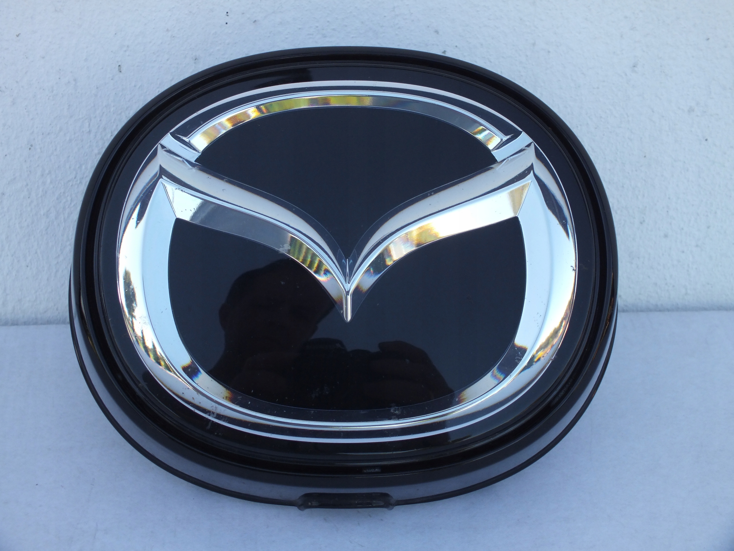 MAZDA 6 GL GJ LIFT 18- EMBLEMAT ATRAPY POD RADAR Marka Mazda