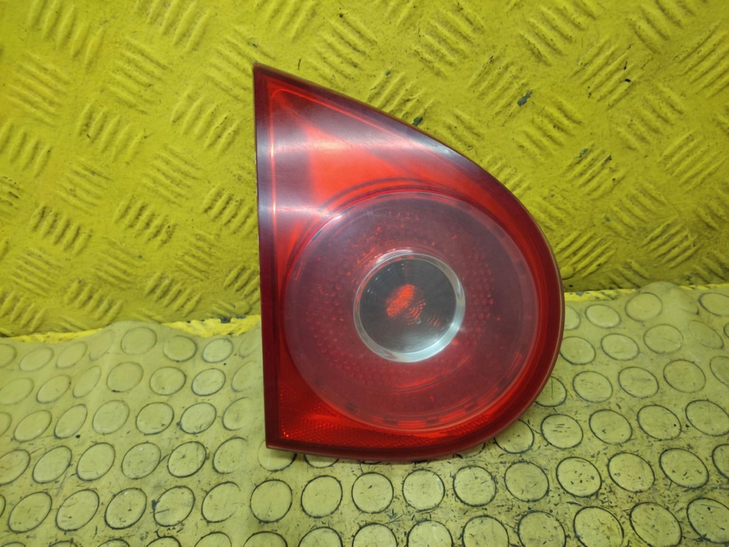 VW GOLF V light left rear part to the bonnet 1K6945093G
