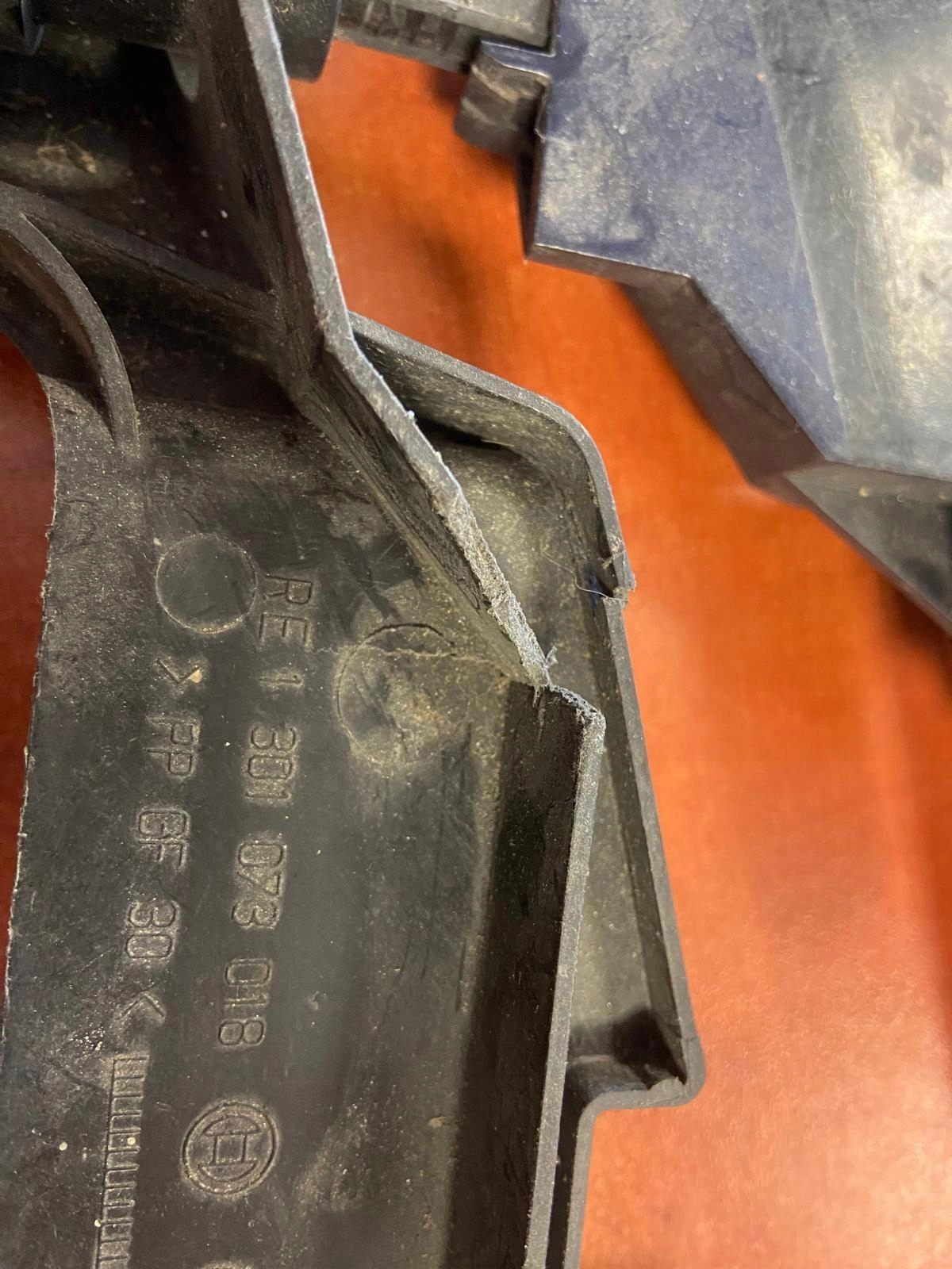 BMW E46 support holder lights right front+washer 1301073018