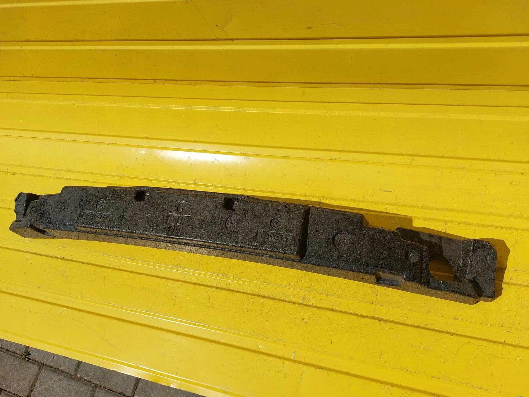 Амортизатор бампера Тойота Королла Э21 52611-02520