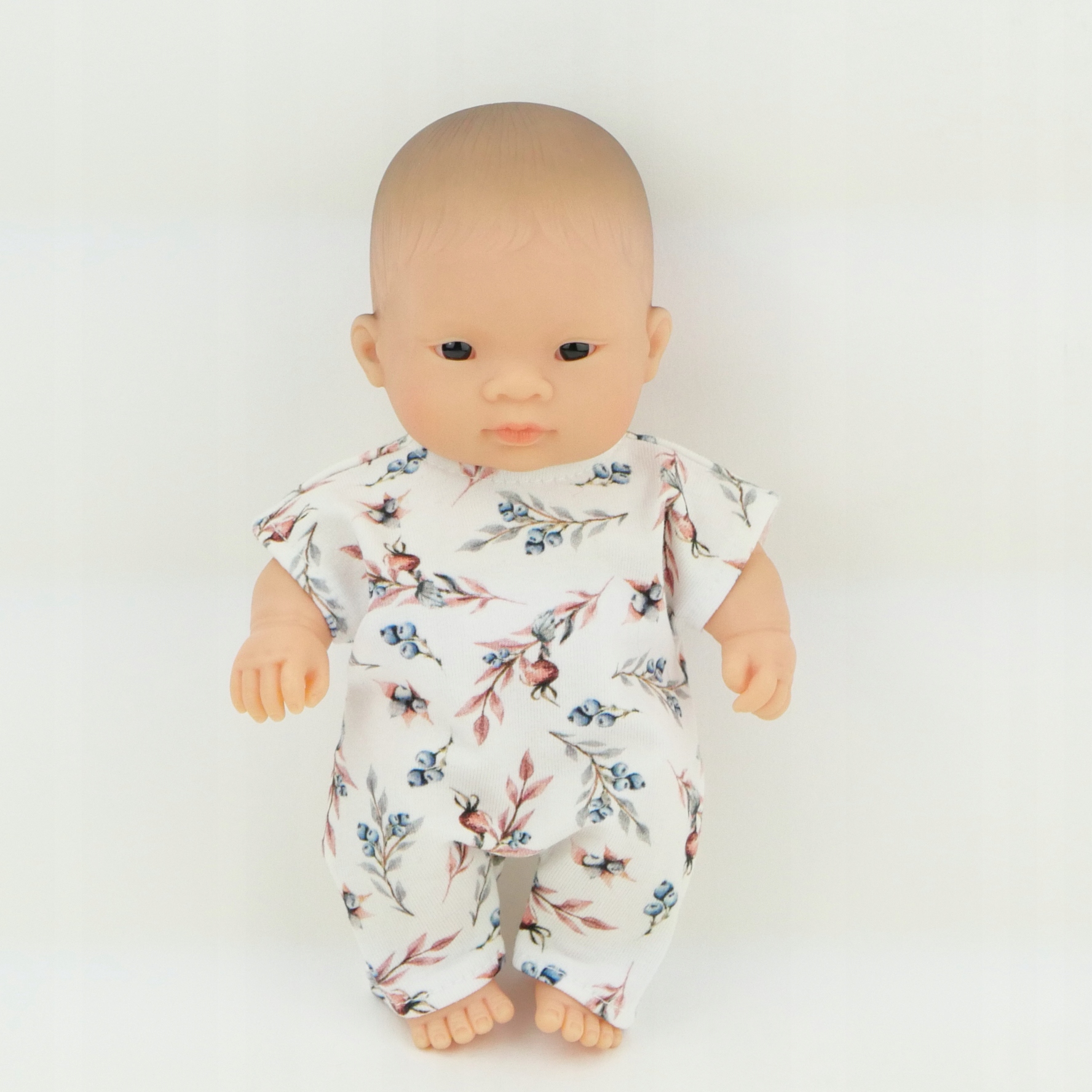 

Ubranko Miniland Baby 21 cm kombinezon z borówkami