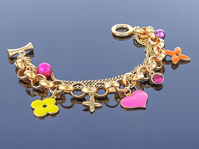 

Złota bransoletka Charms