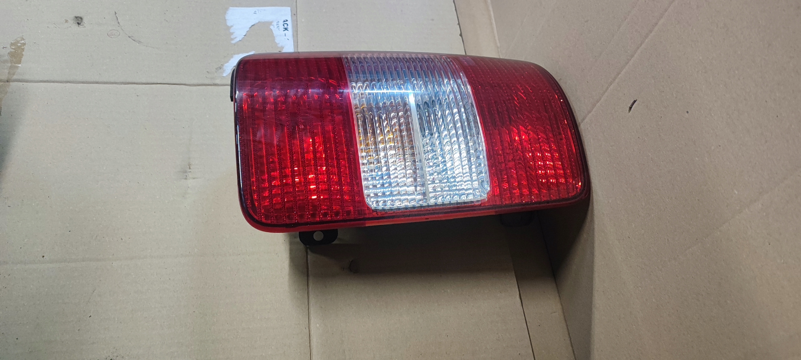 VW CADDY III LIFT 10-15r. light rear part rear left complete LADNA