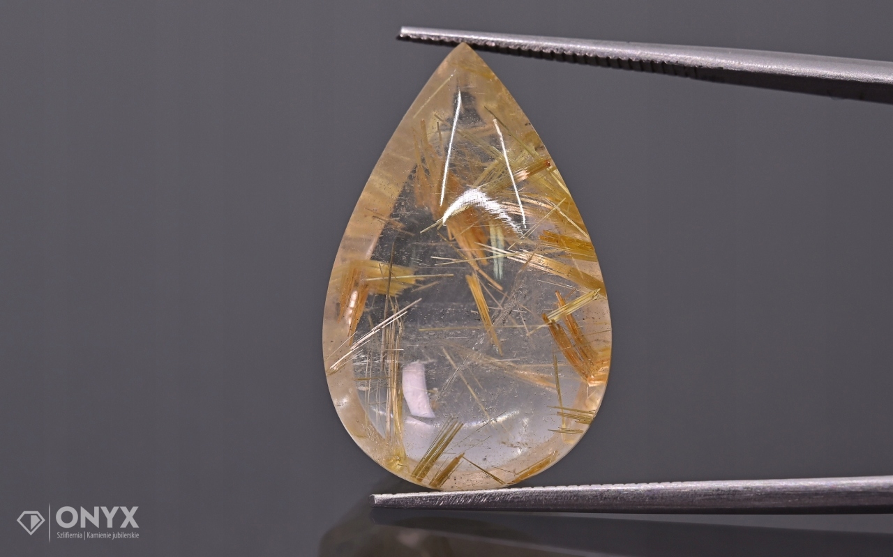 Křemen s rutilem konvexní mělká slza 24,5x15,5 mm