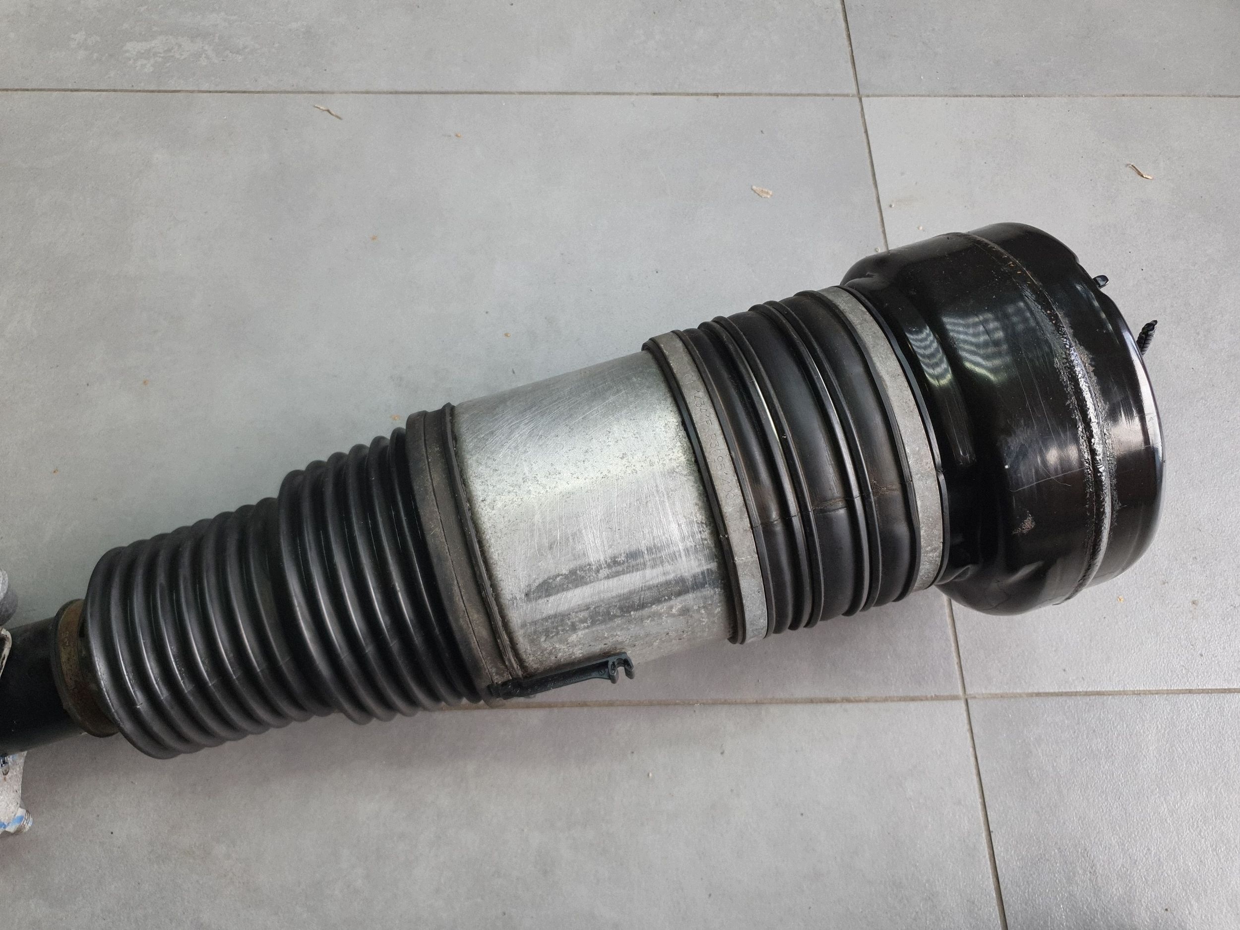 Audi Q7 4M shock absorber pneumatic right front 4M0616039AD