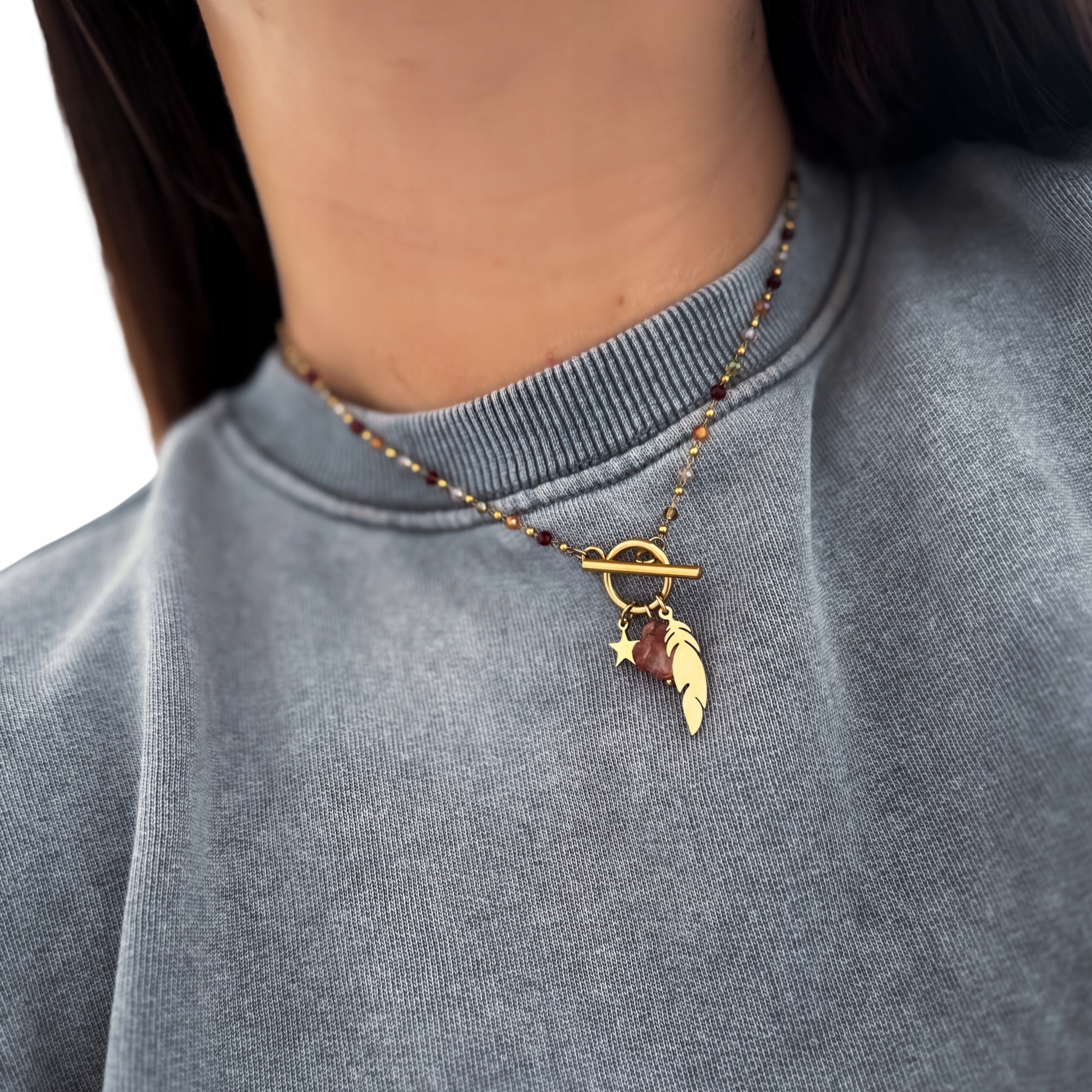 Pozłacany naszyjnik z piórkiem gwiazdką i kamieniem koraliki stal 316L boho