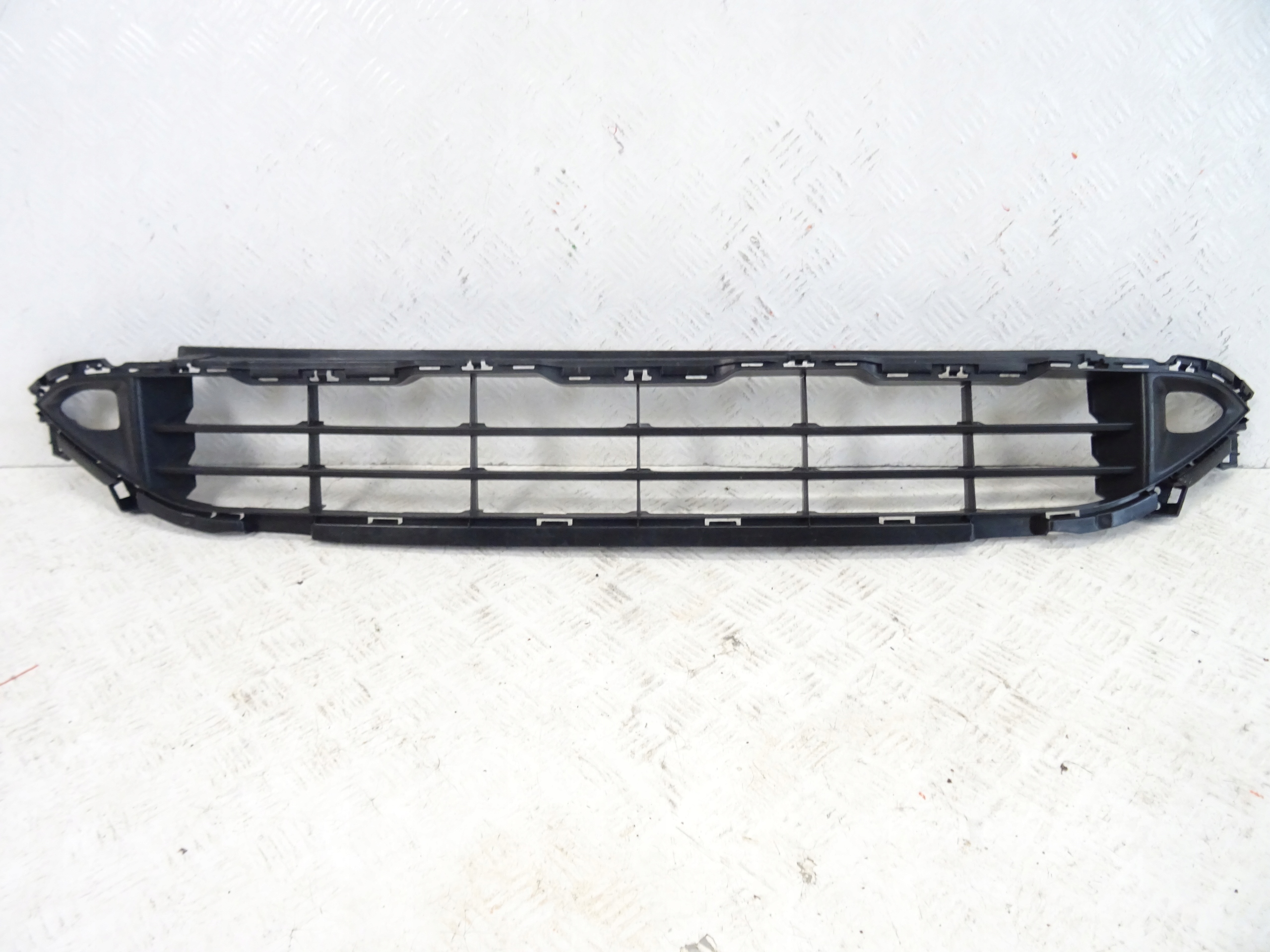 grid of a bumper front front NISSAN X-TRAIL IV 62254-6RA0A