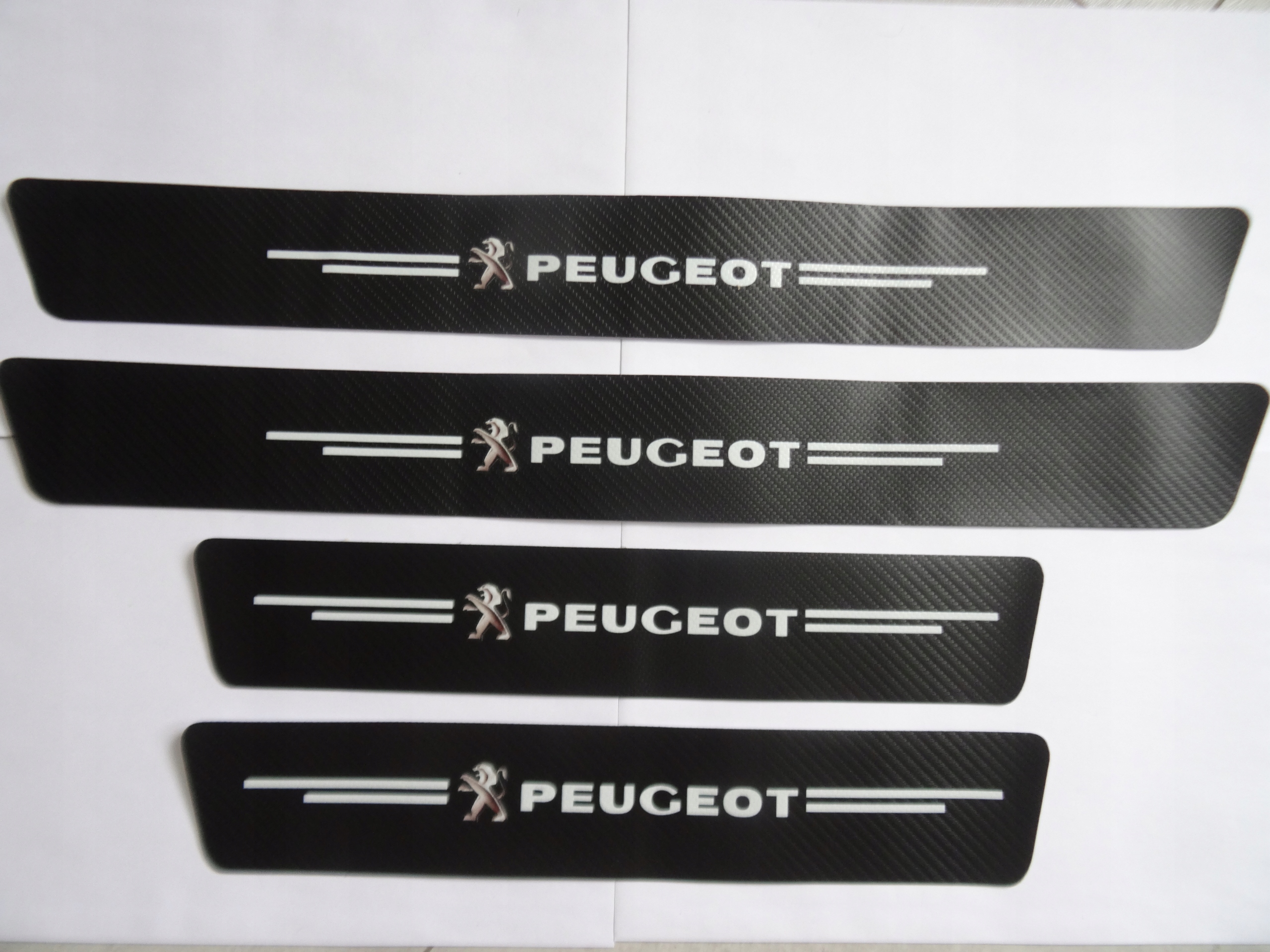 

Naklejki nakładki folia ochronna na progi Peugeot