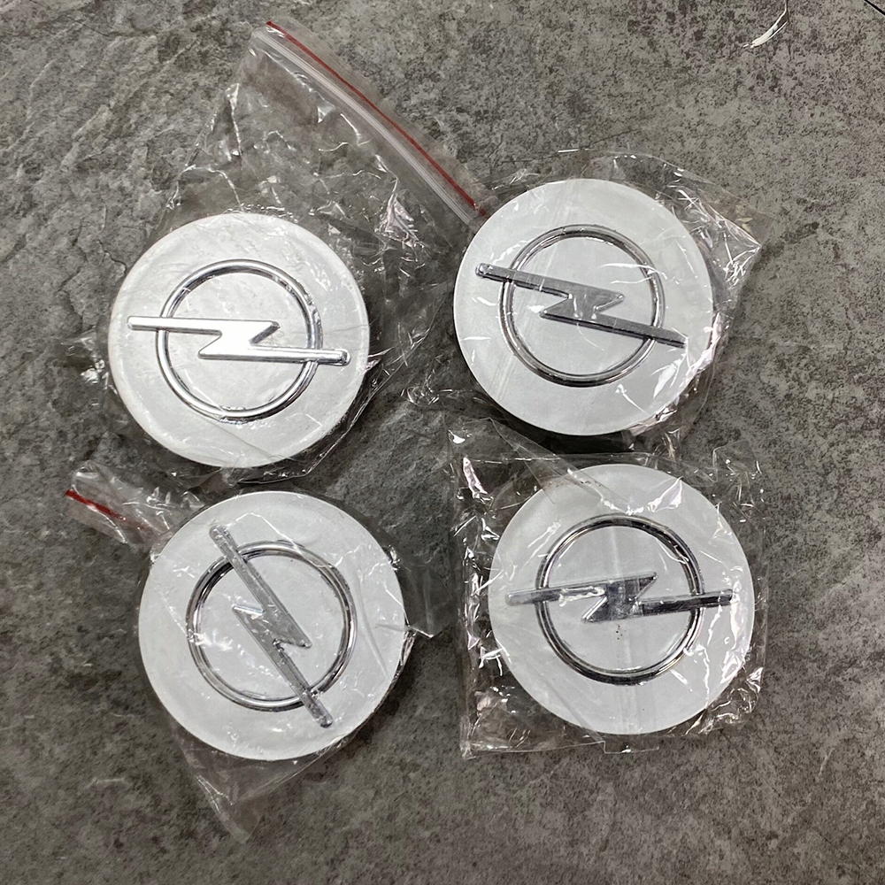 

Opel Dekielek Dekielki Kapsle Dekiel 64MM 4szt