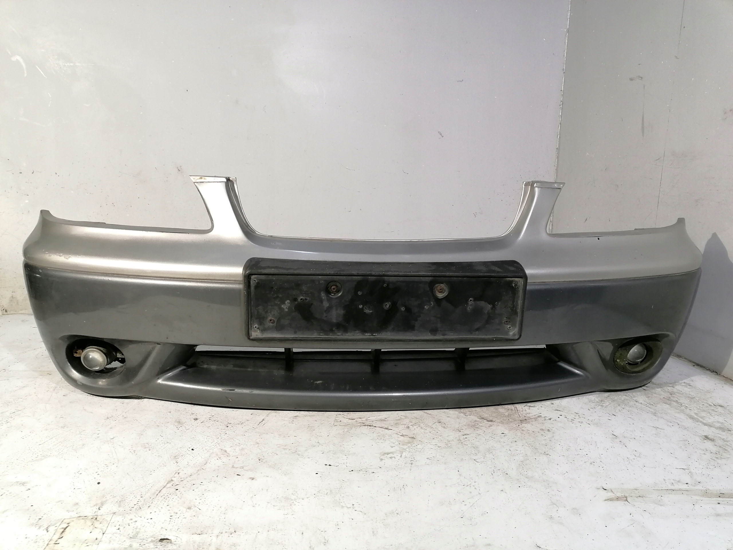 Kia Carens and bumper front front