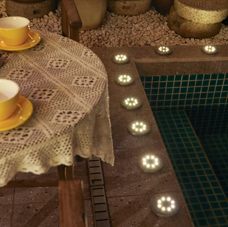 12x LAMPKI OGRODOWE SOLARNE GRUNTOWE WBIJANE NAJAZDOWE 16 LED ŚWIECĄCY DYSK Długość wbijanego grota 10.3 cm