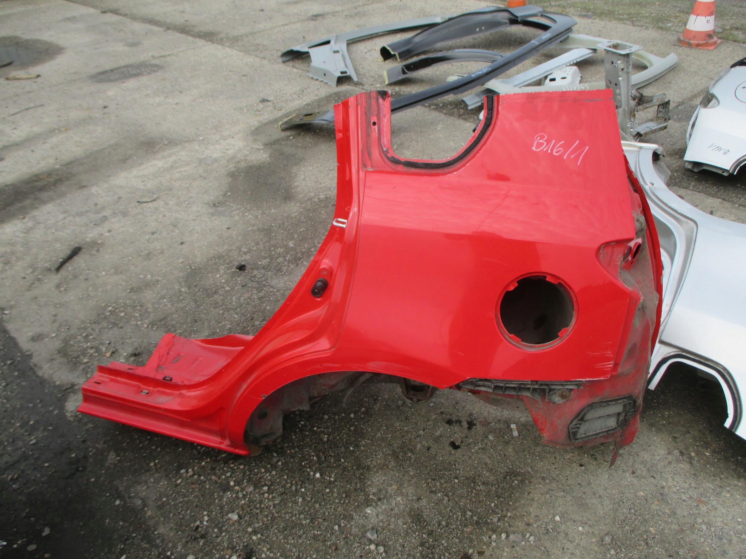 MAZDA 2 II 02-07 BŁOTNIK LEWY TYŁ