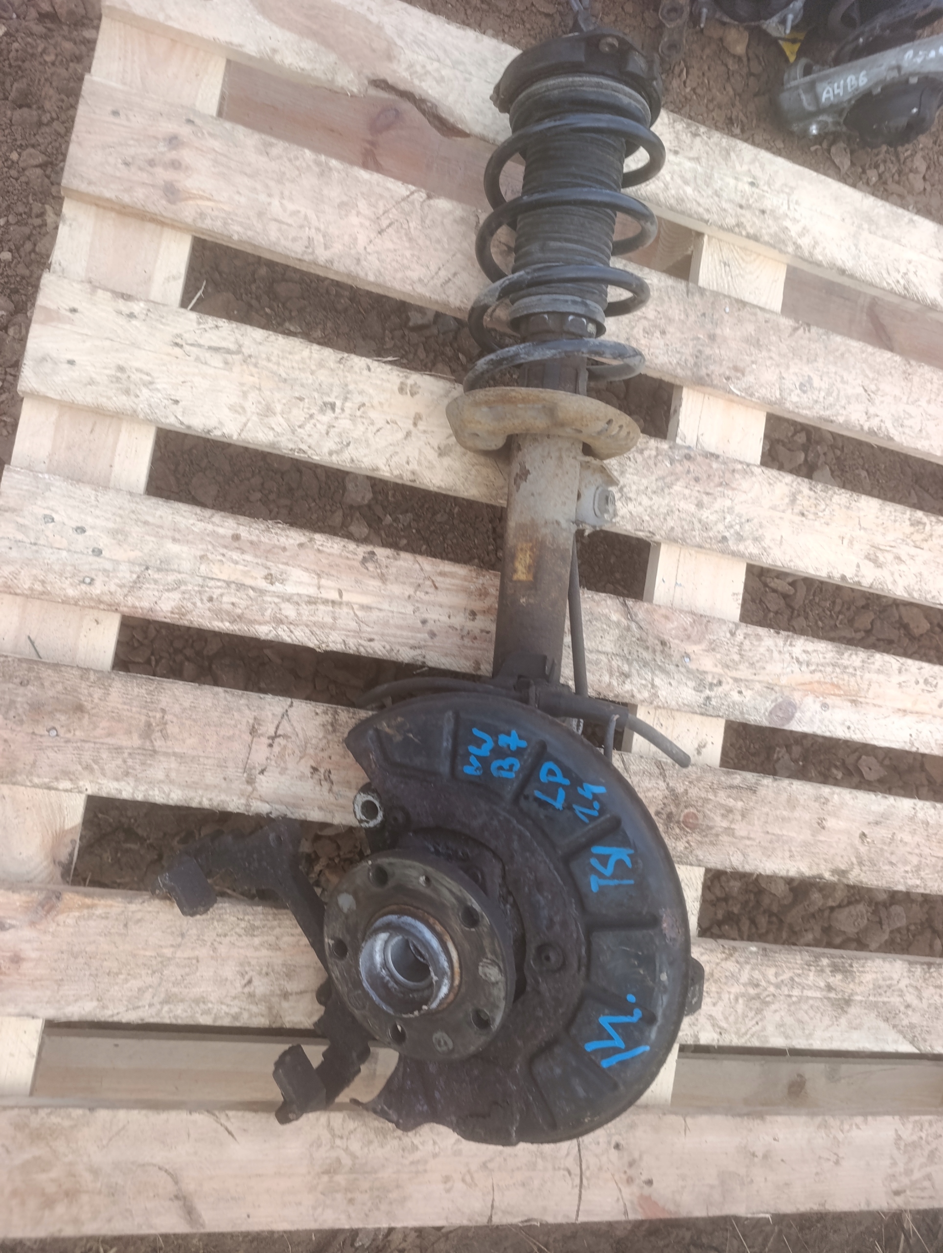 Macpherson shock absorber left front front swing Volkswagen Passat B7