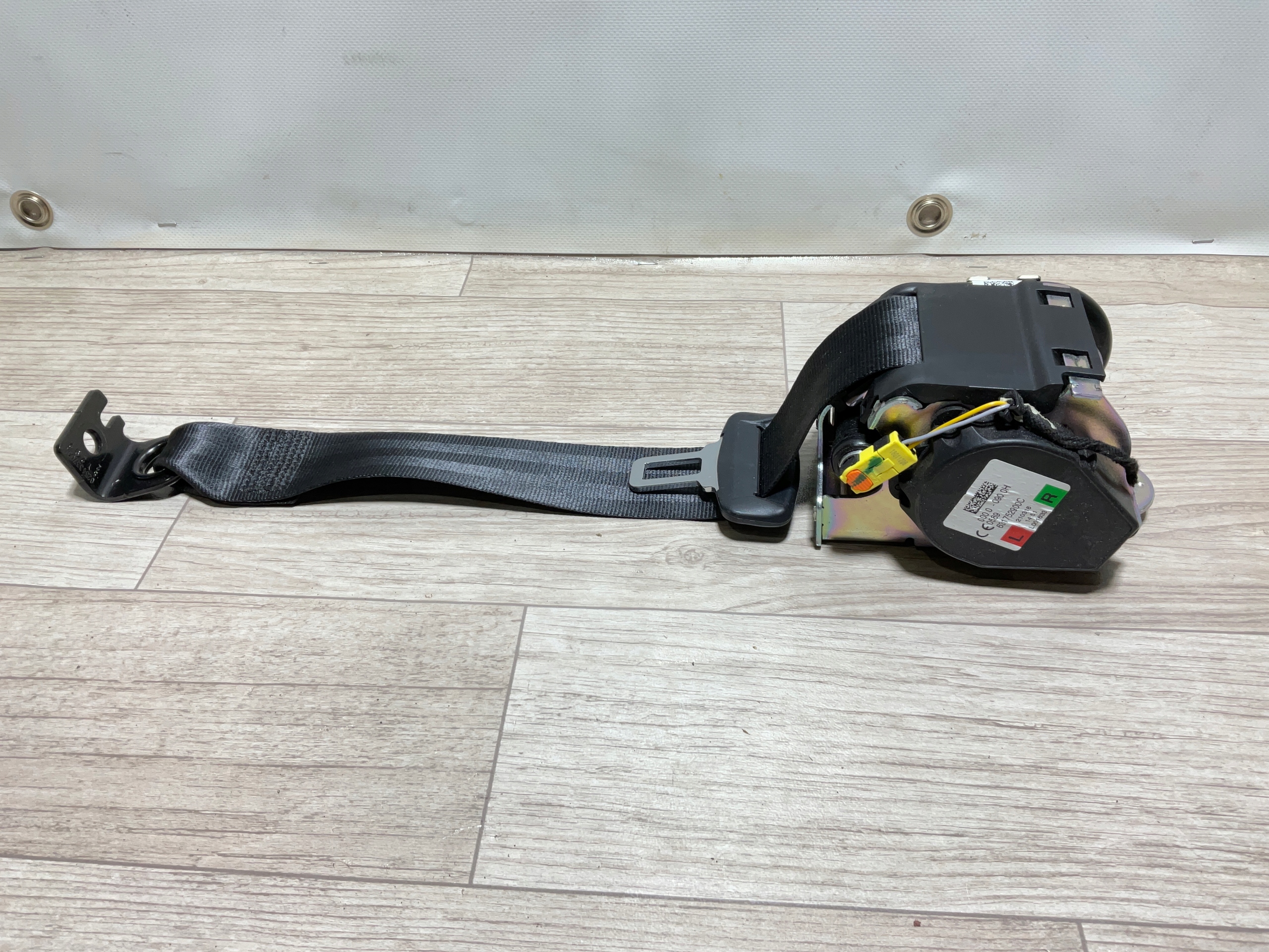 HK83-611B68-AB8P - ЗАДНІЙ НАТЯГУВАЧ РЕМЕНЯ L / P F-PACE VELAR 631752900C