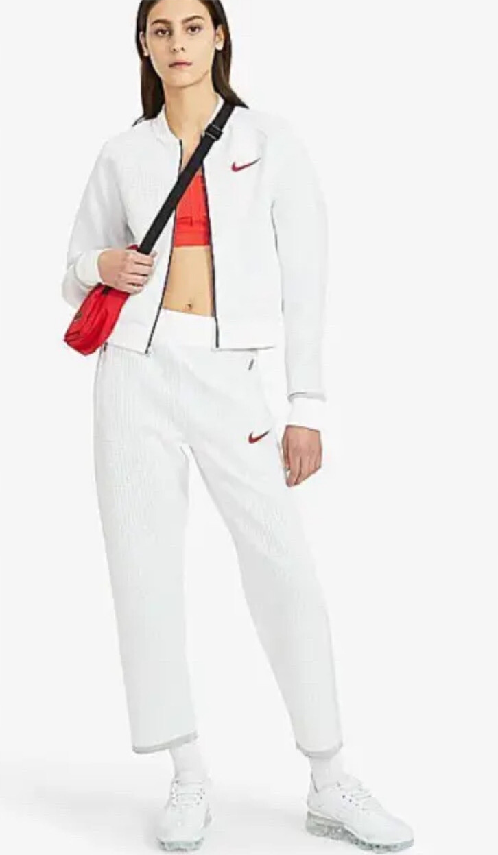 Nike Dámské sportovní kalhoty tepláky volnočasové bílé L