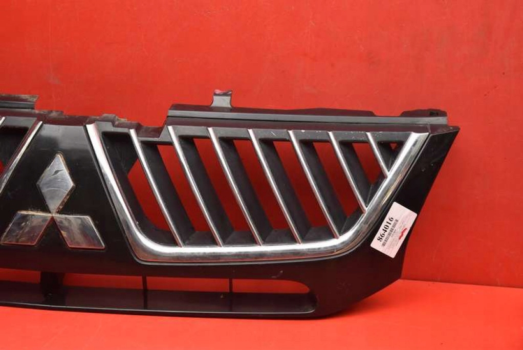 front PREKLADgrill black CHROM P4686 MITSUBISHI L200 06-14