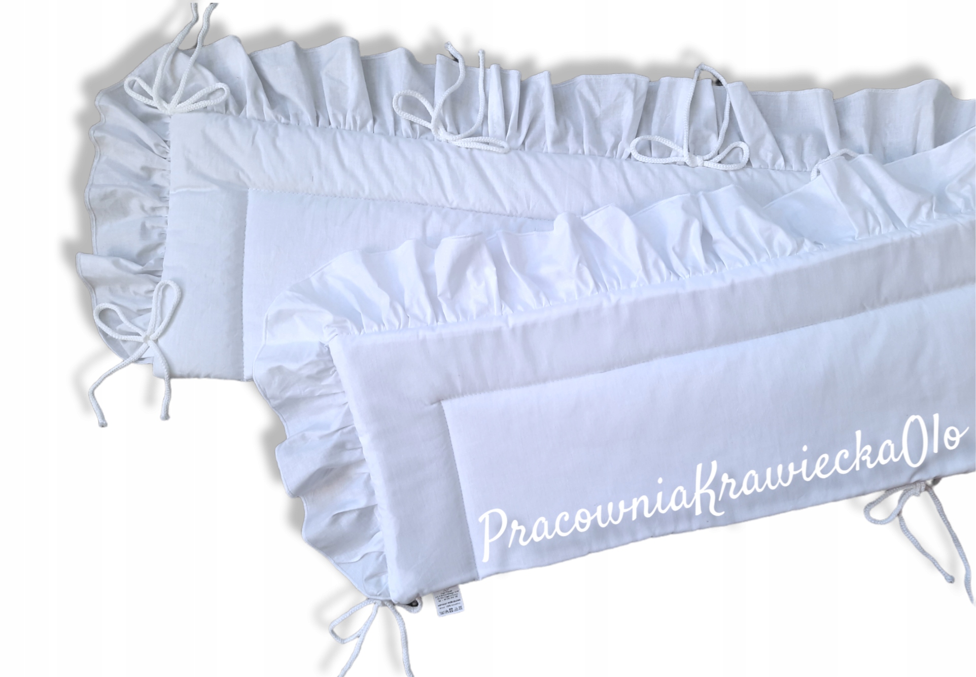 

Ochraniacz do łóżeczka z falbanką Biały