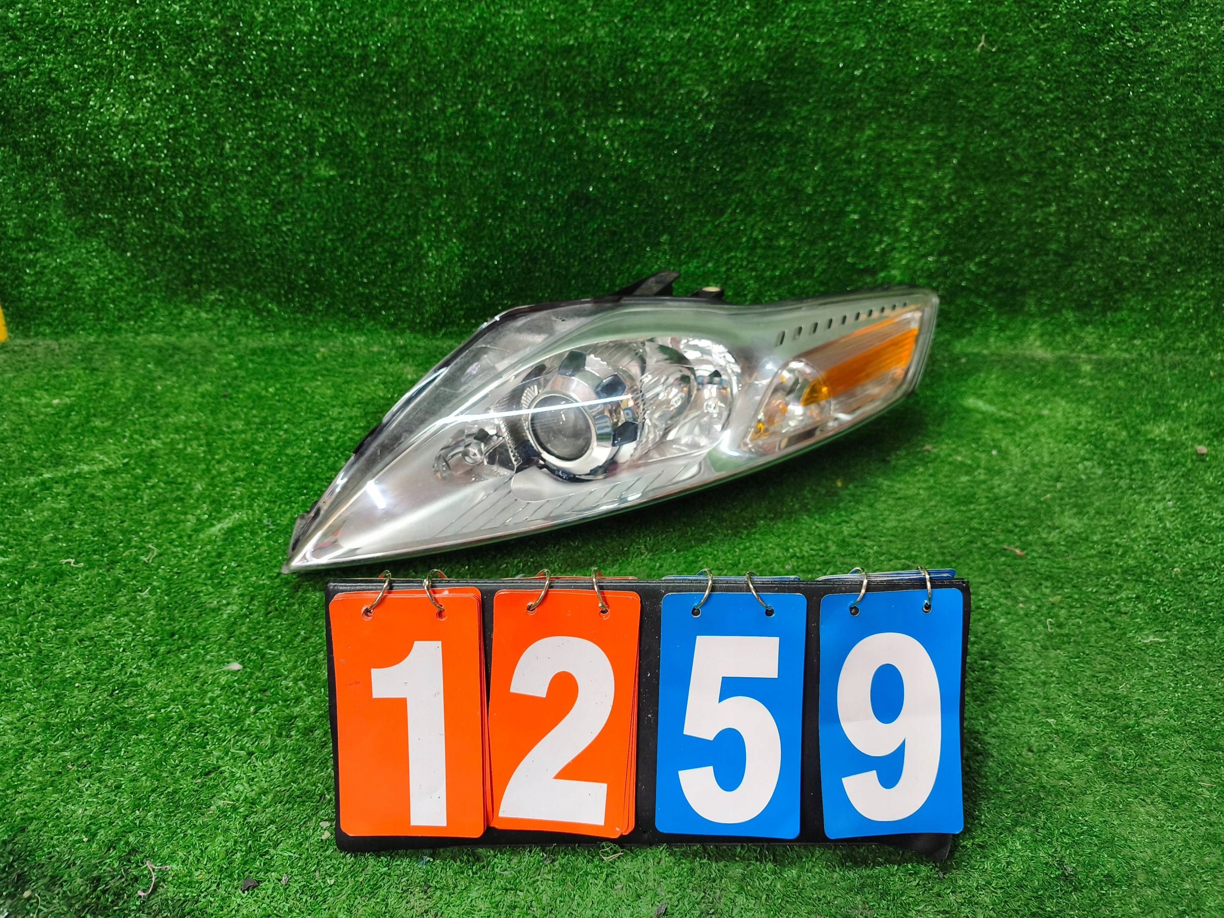 REFLEKTOR left front FORD MONDEO MK4 lens NR.1259