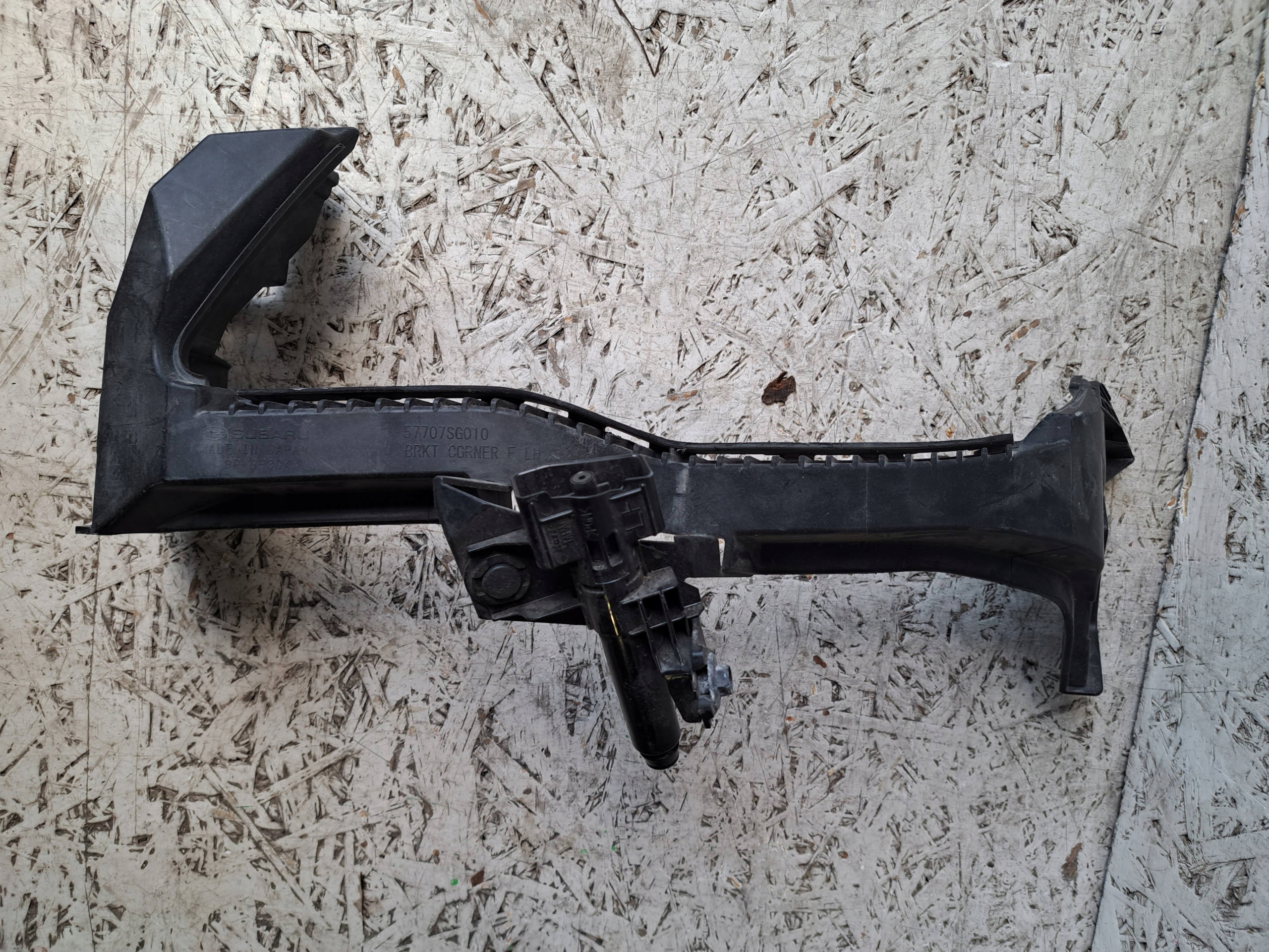 57707SG010 - SUBARU FORESTER IV КОВЗАЮЧА ЛАМПА ЛІВИЙ ОМИВАЧ