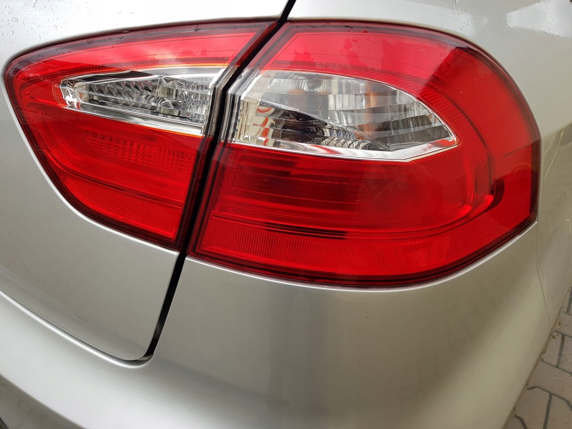 KIA RIO III light left rear part W fender 2011