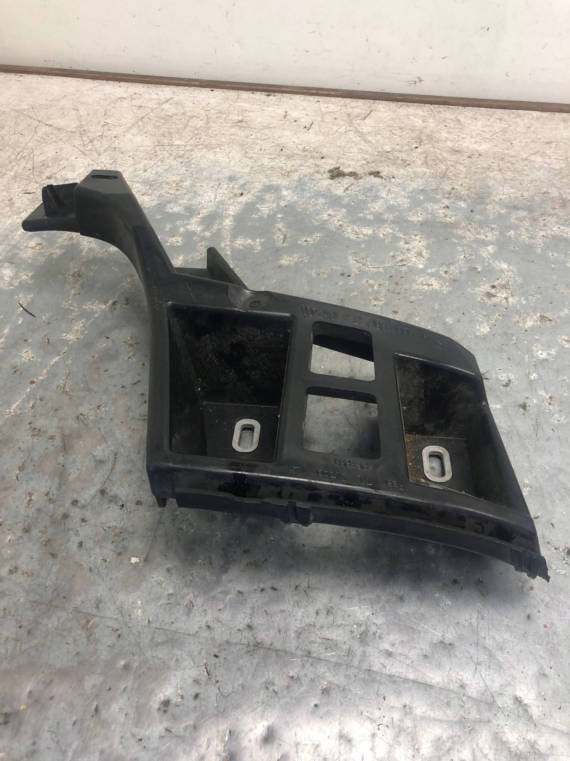 bumper bracket left rear part MERCEDES W166 ML A1668803303