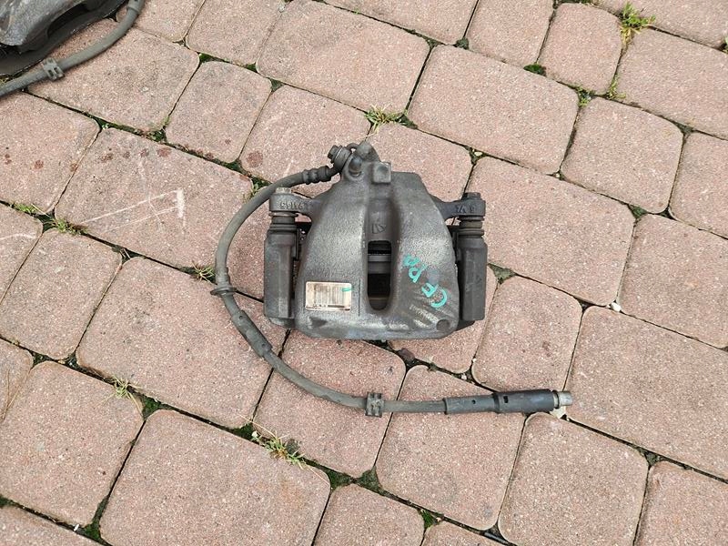 caliper front front right wheels front Opel Corsa F E-Corsa 9824176680