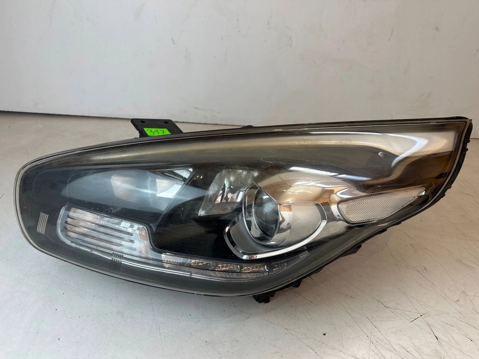 light front front left Kia Carens IV 13-16 UK Anglik